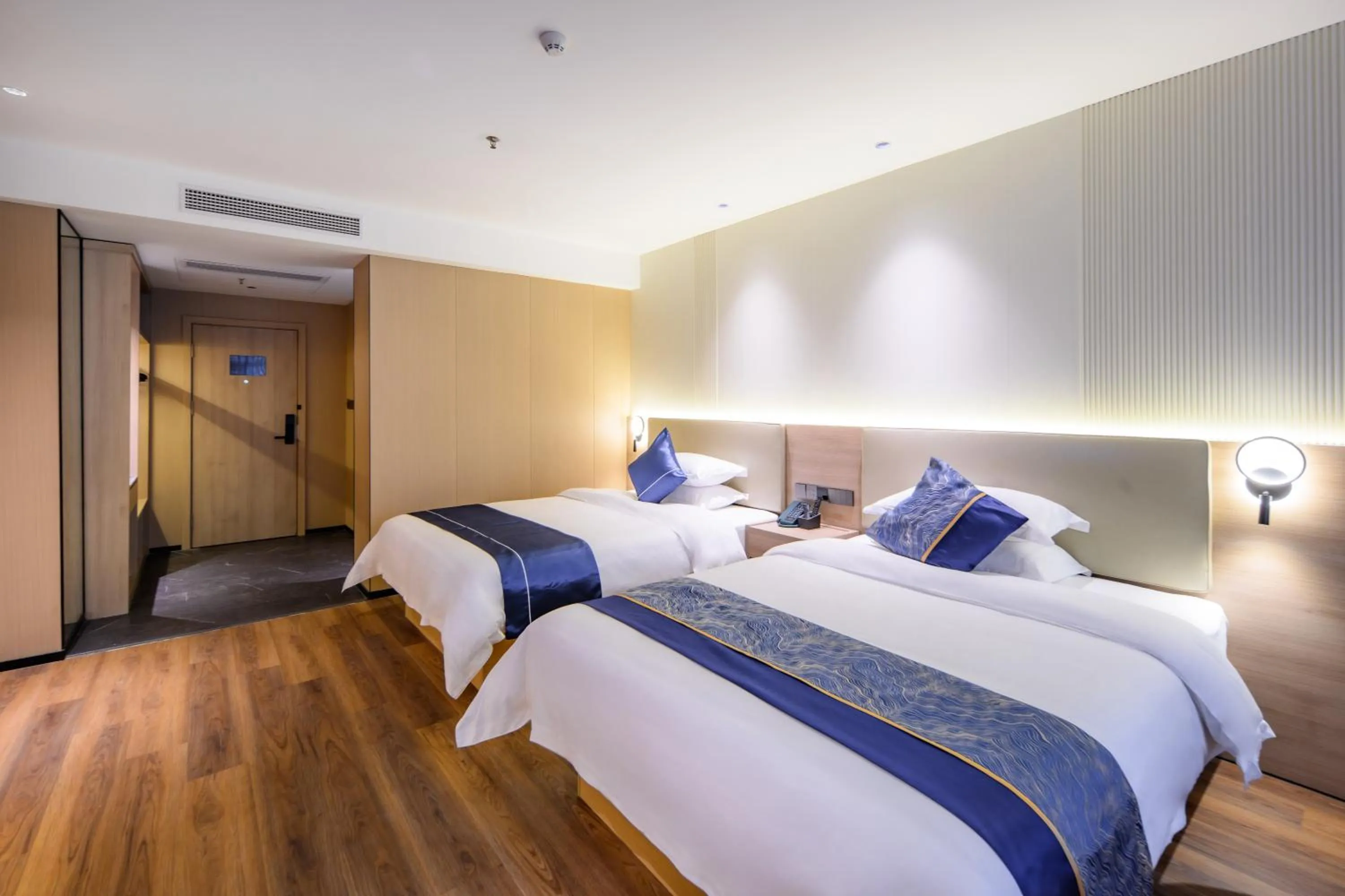 Bed in Shanshui S Hotel