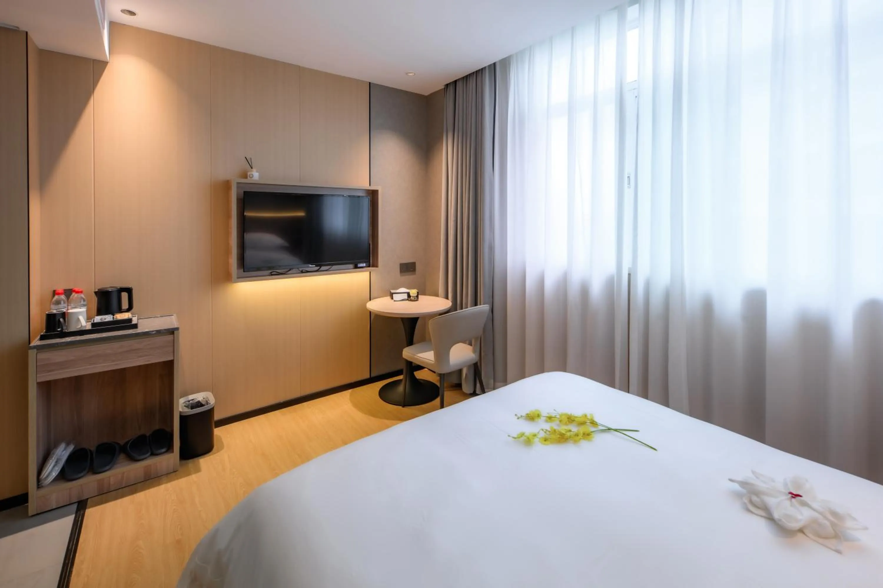 Bed in Shanshui S Hotel