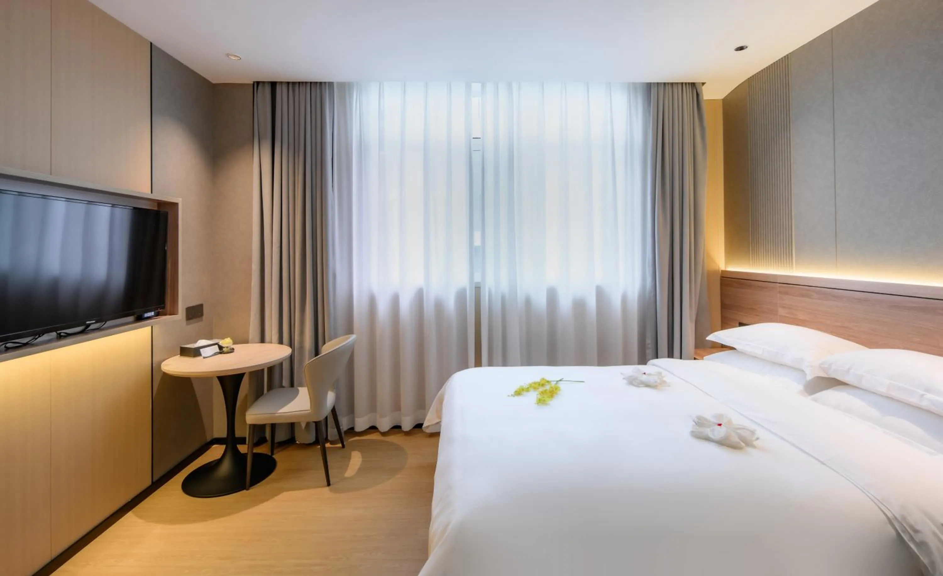 Bed in Shanshui S Hotel