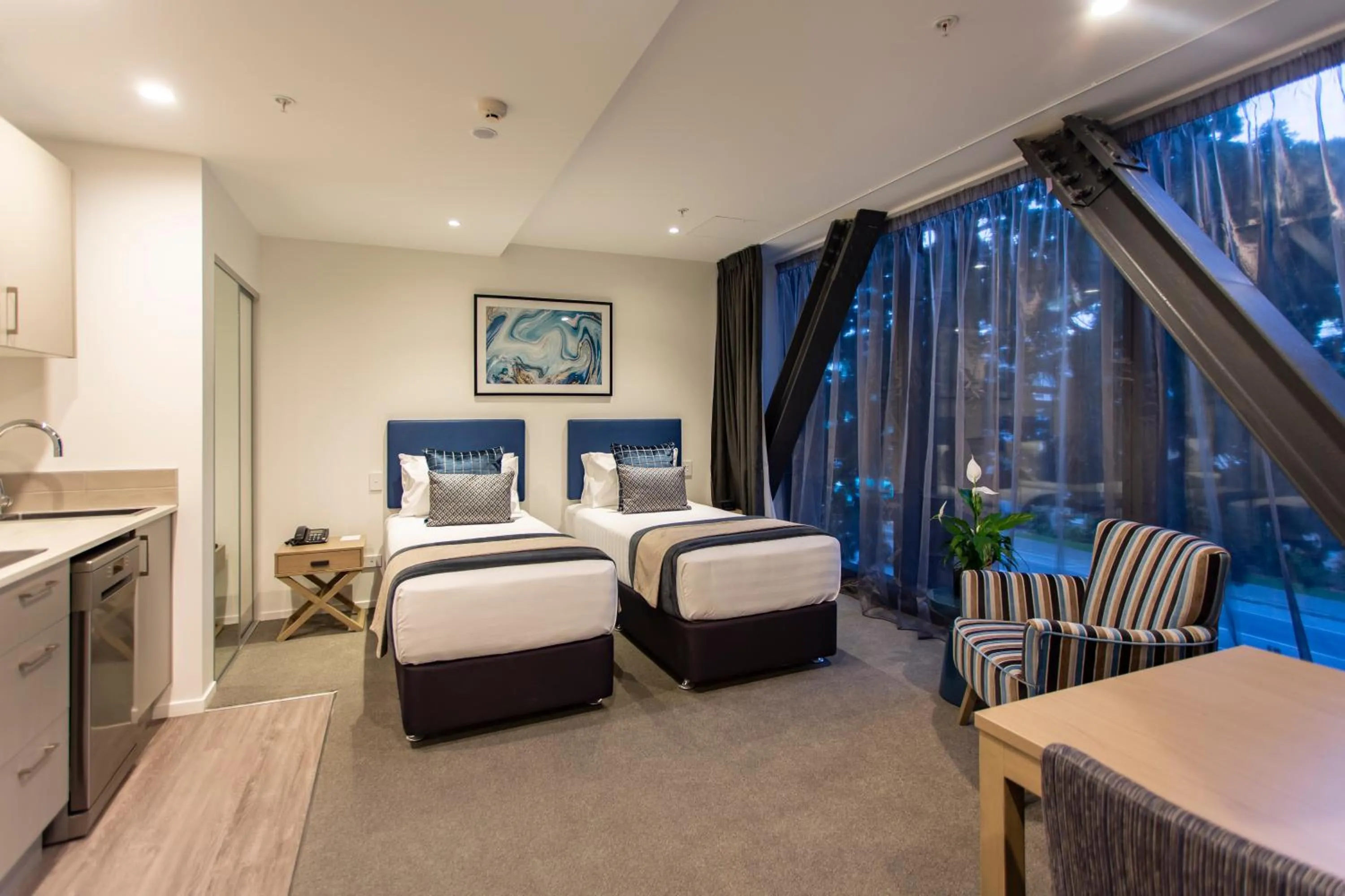 Bed in Ramada by Wyndham Queenstown Central