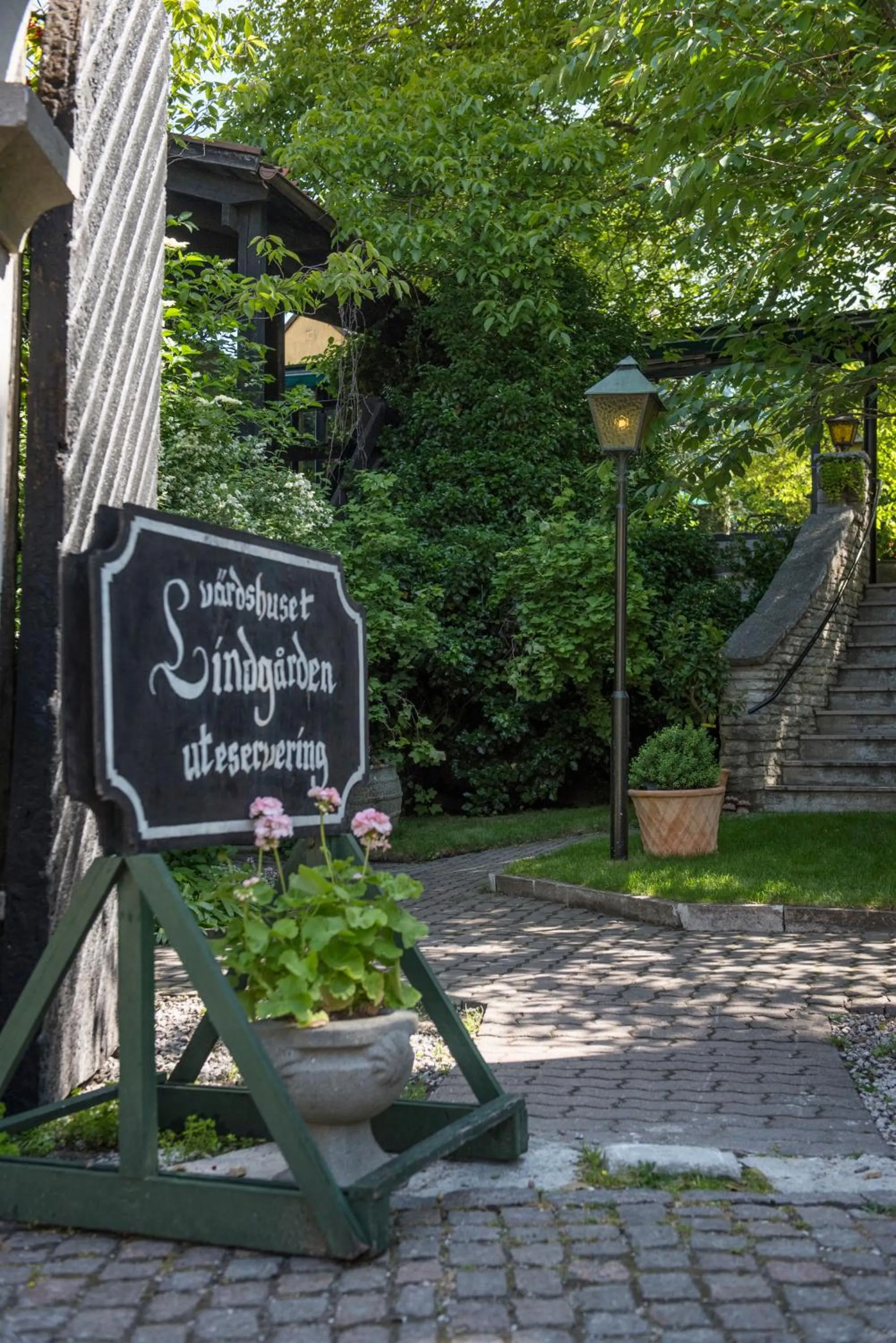 Property logo or sign in Värdshuset Lindgården