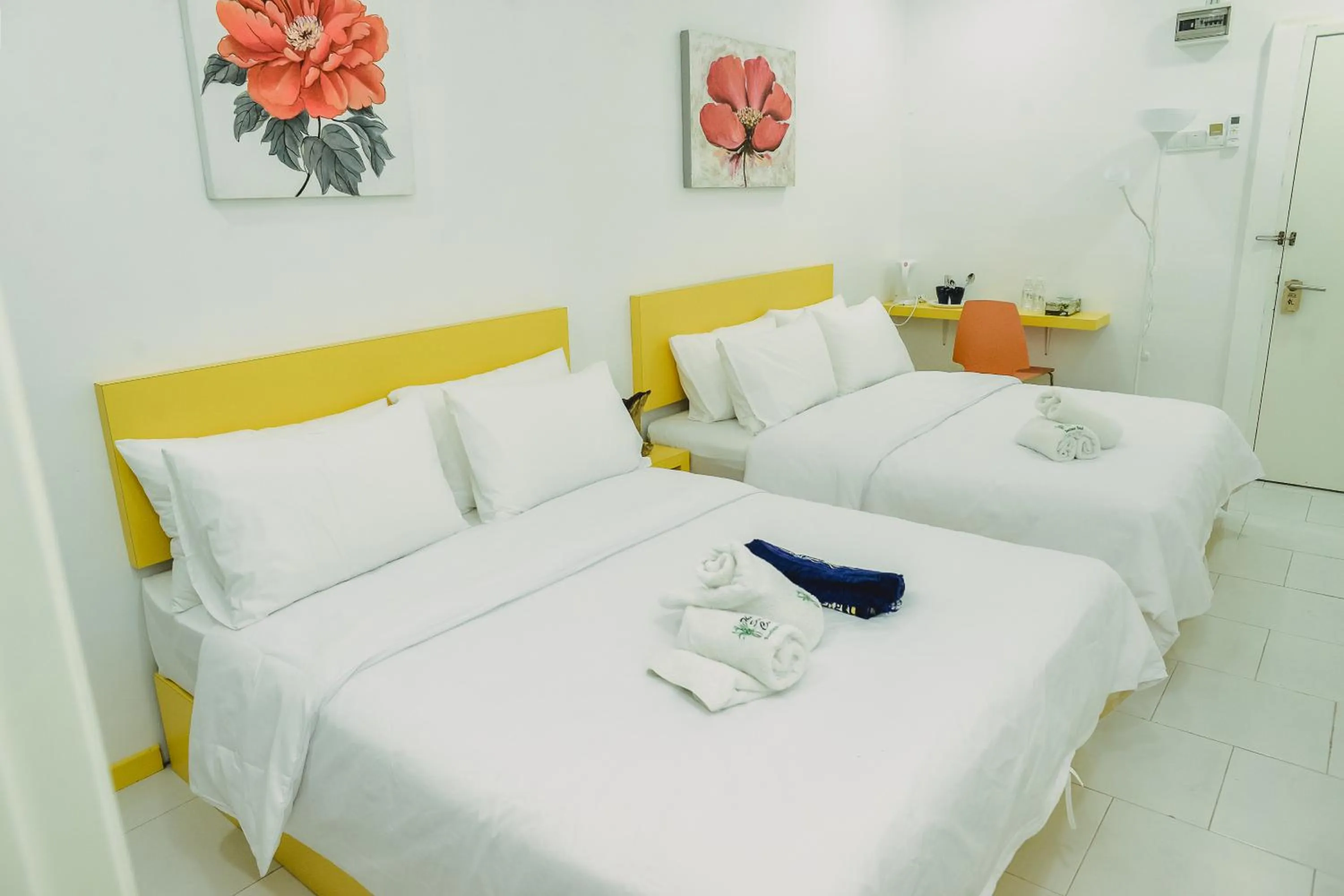 Bed in The Serai Cottage Downtown Hotel