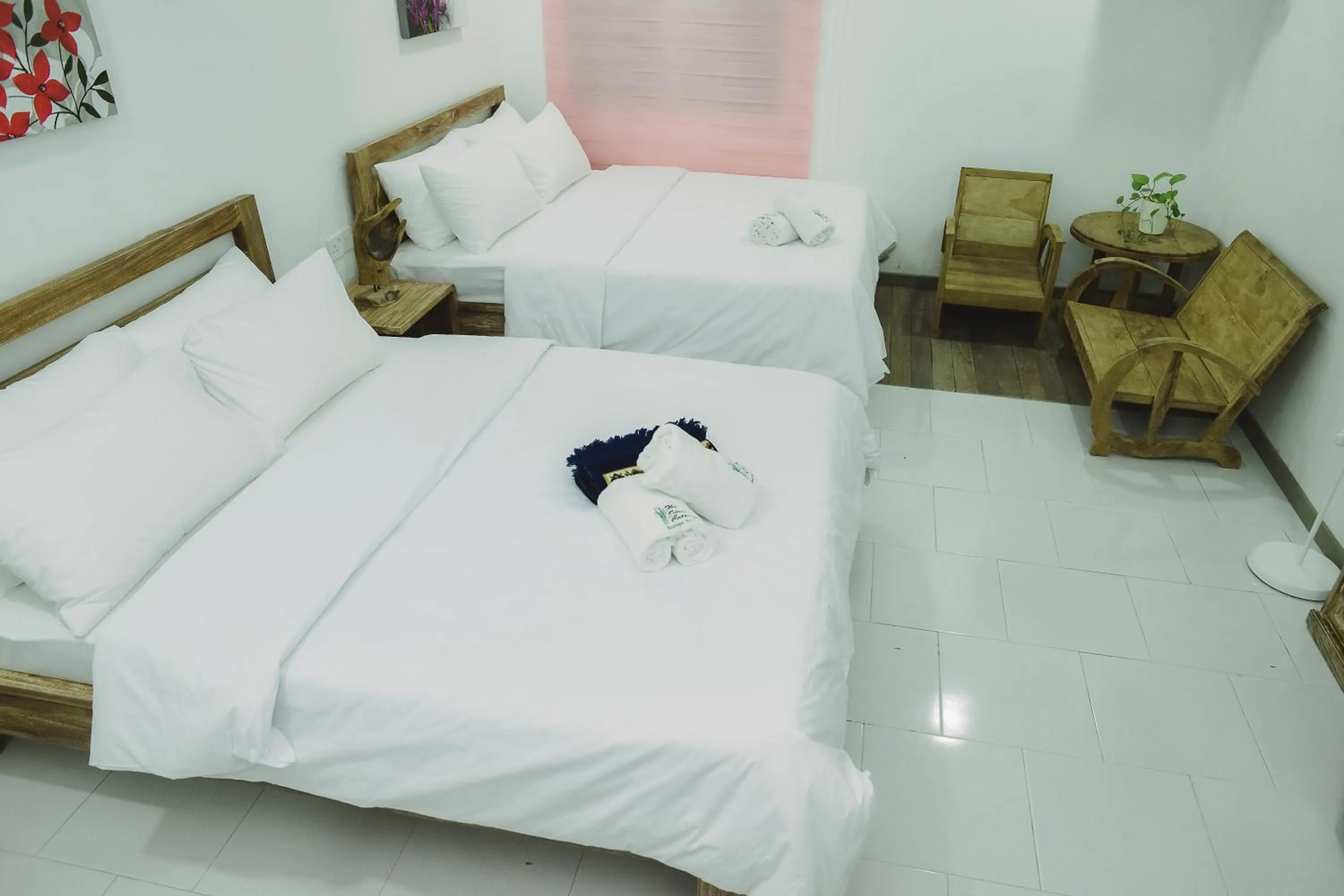 Bed in The Serai Cottage Downtown Hotel