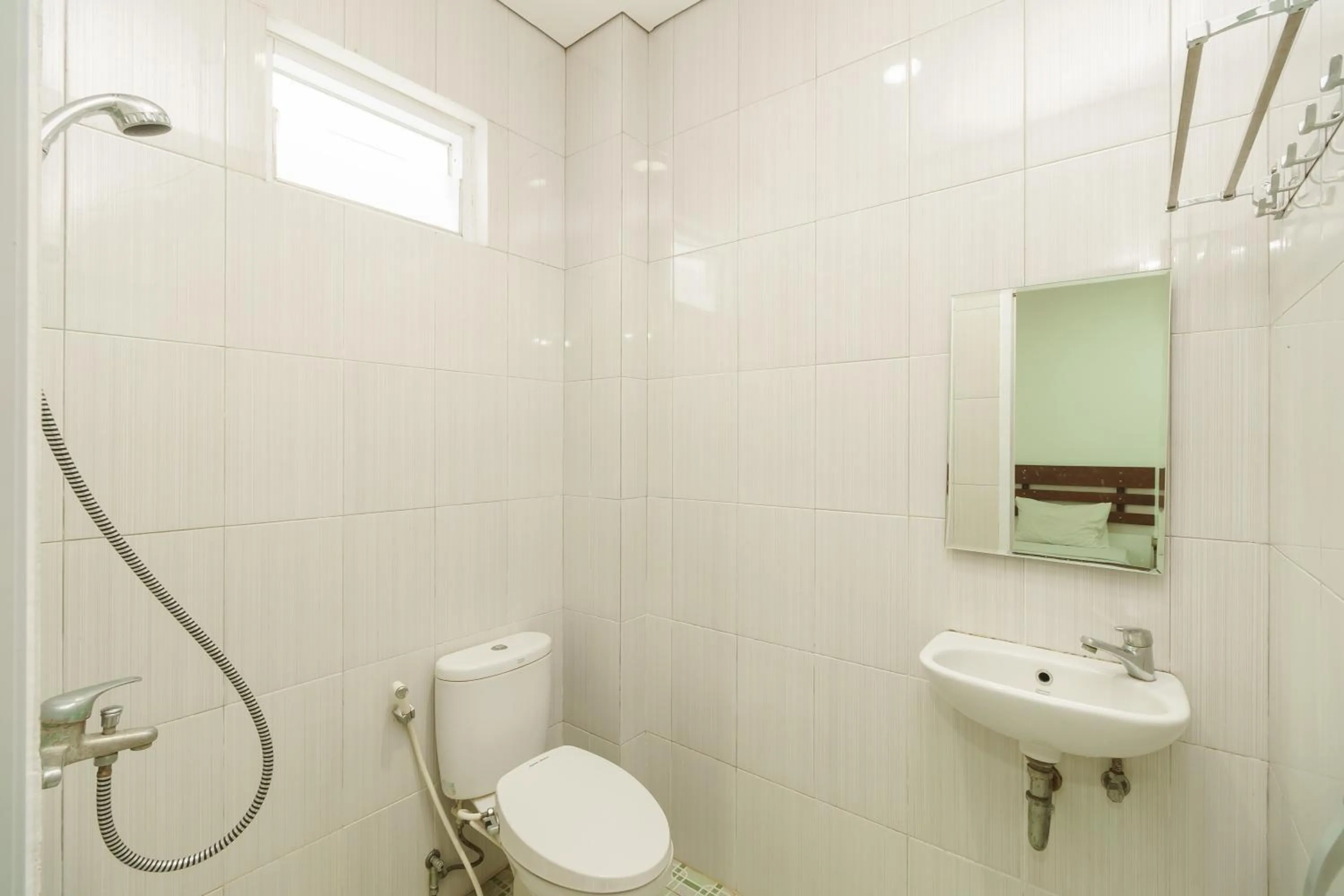 Bathroom in RedDoorz Syariah near Jembatan Siti Nurbaya Padang