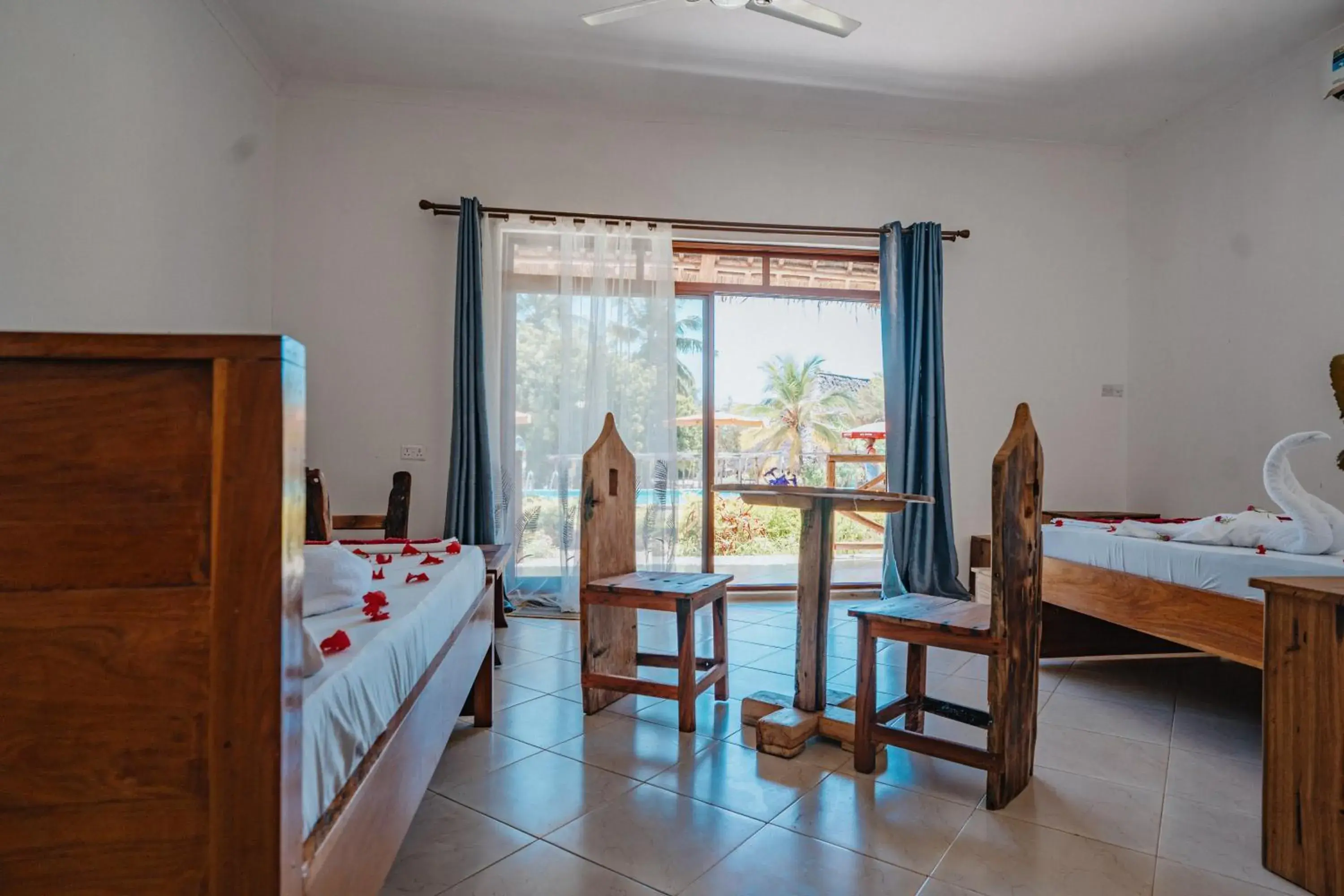 Triple Room with Pool View in Bella Vista Resort Zanzibar Triple Room with Pool View in Bella Vista Resort Zanzibar