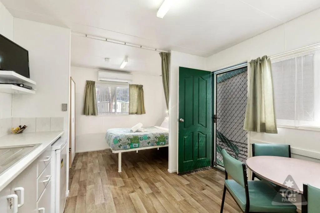 Seating area, Bed in Gawler Caravan Park