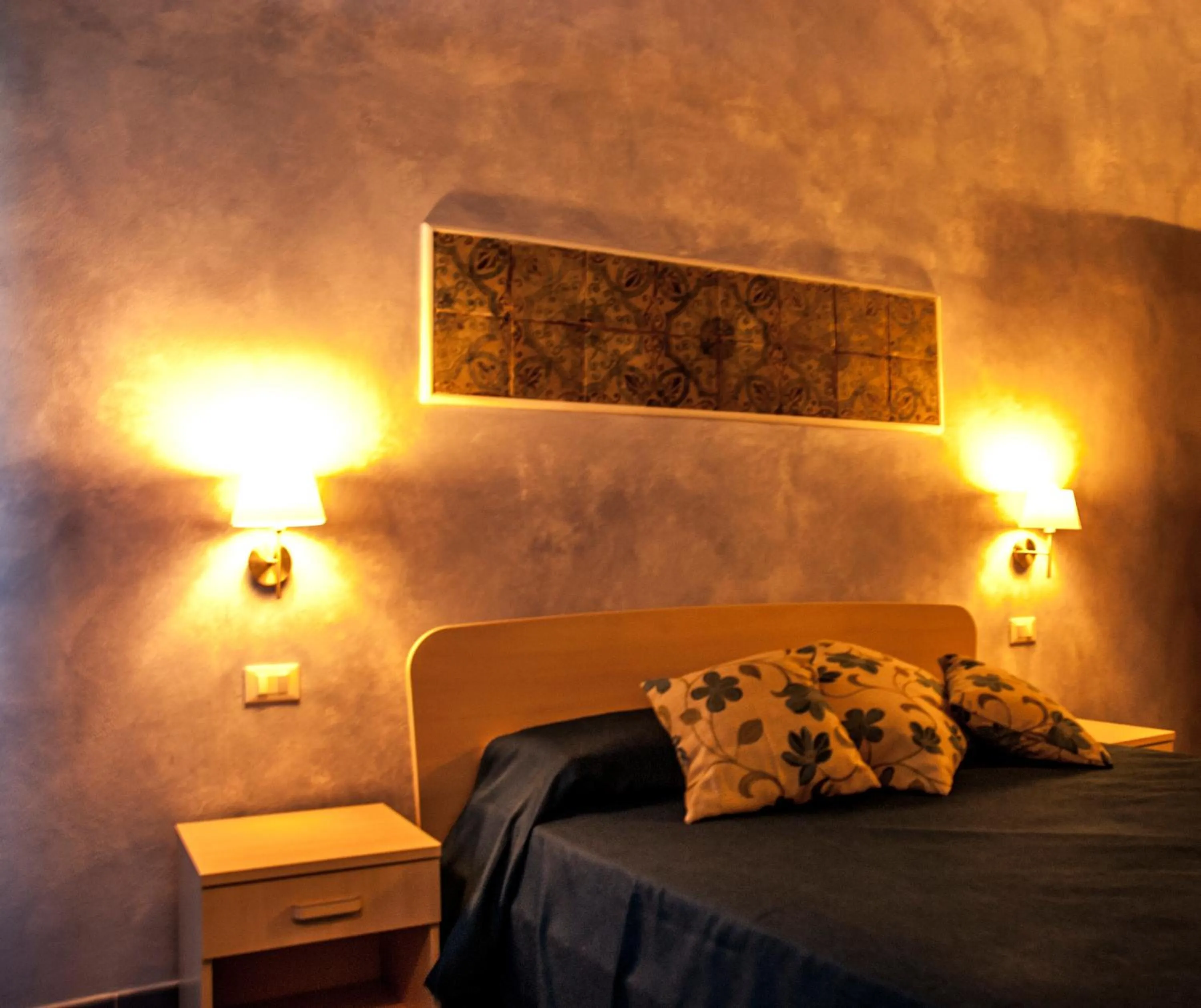 Bed in Blu Tropea Maison