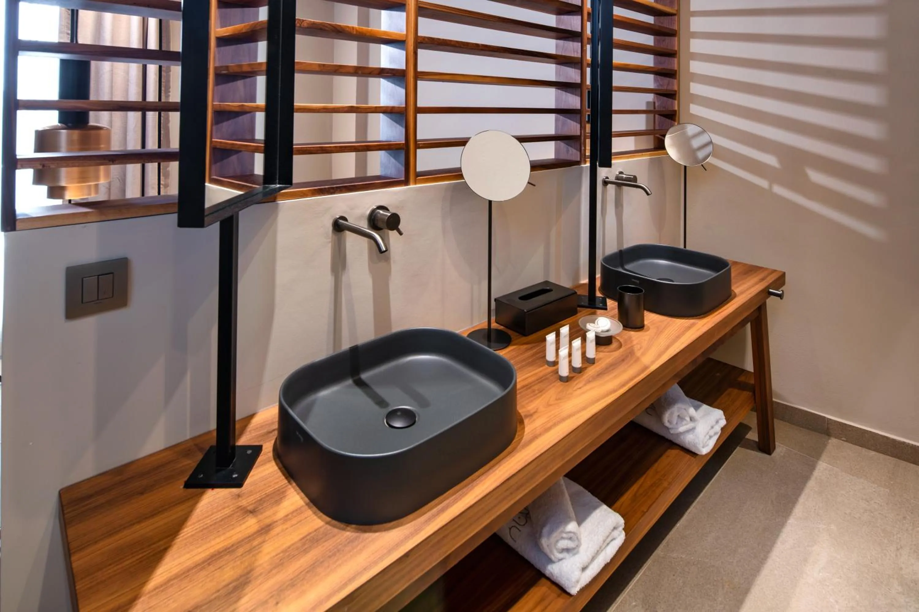 Toilet in Uma Ray Suites