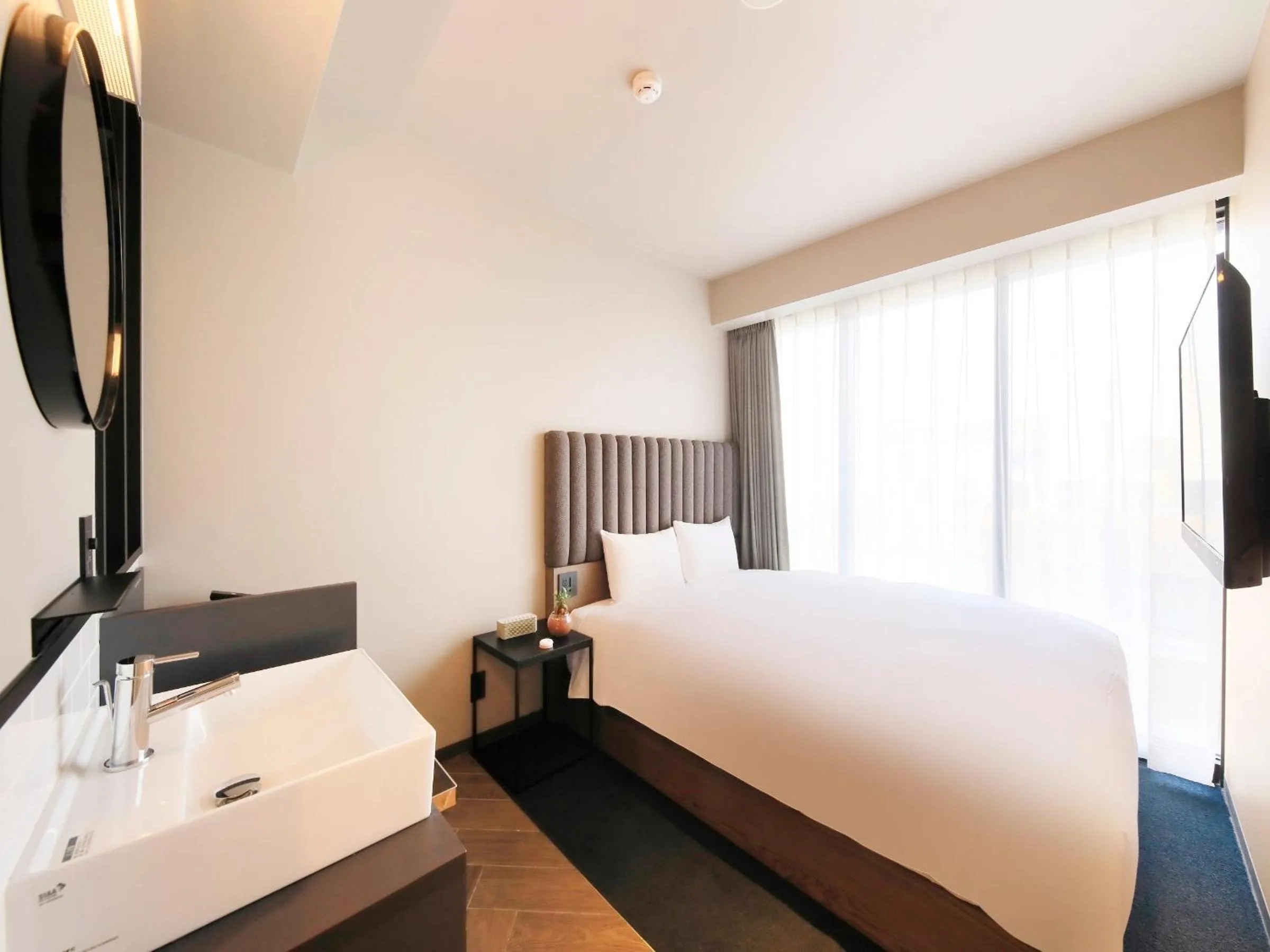 Bed in QuintessaHotel FukuokaHakata Relax&Sleep