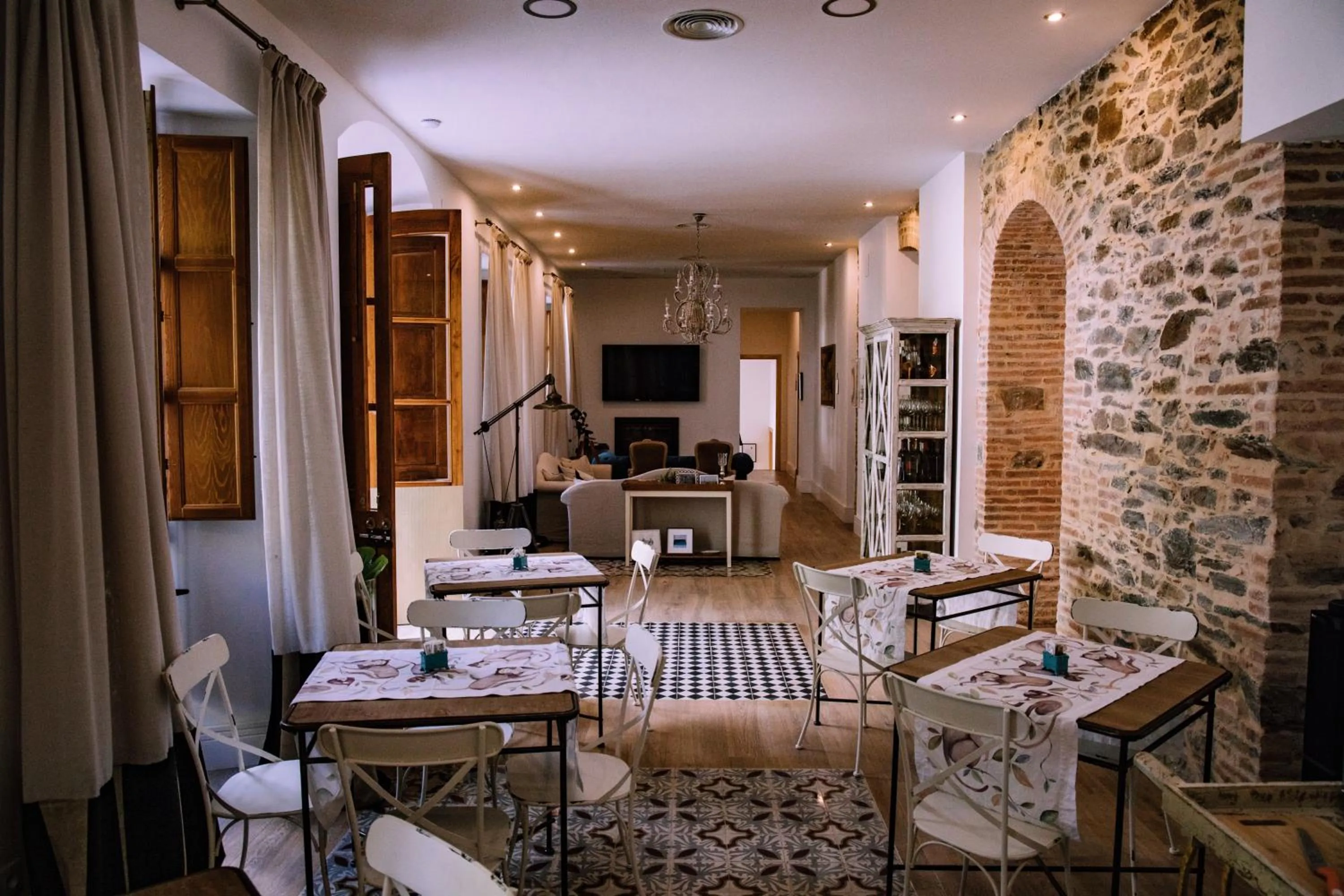 Communal lounge/ TV room in HOTEL LUZ ALMONASTER