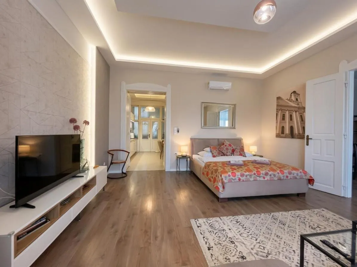 Bed in Visit Debrecen Apartman