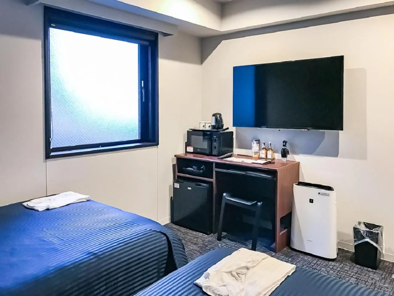 Bed in HOTEL LiVEMAX Nagoya Sakuradoriguchi