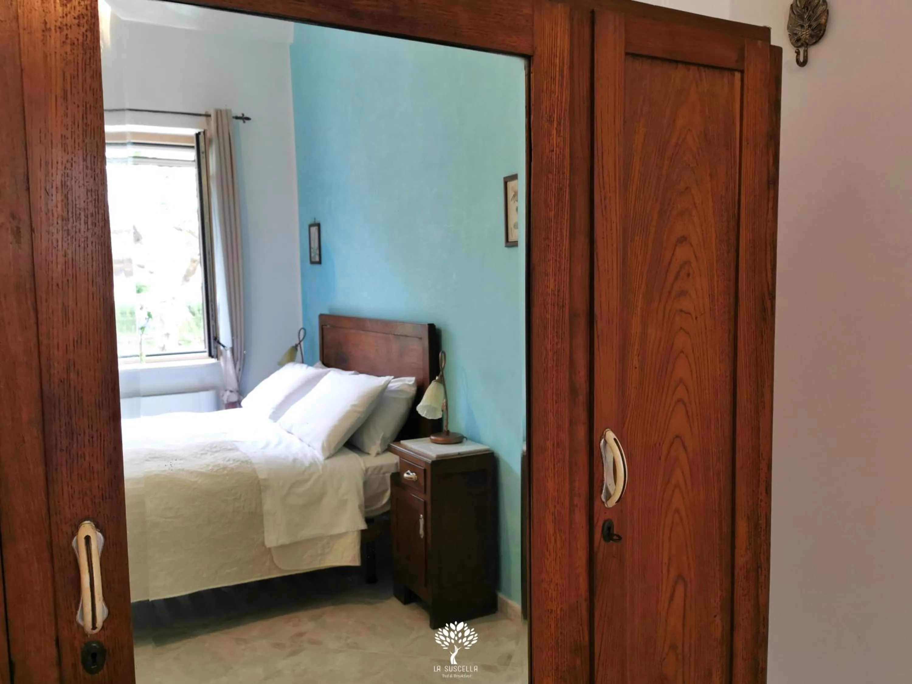 Bed in La Suscella Bed & Breakfast