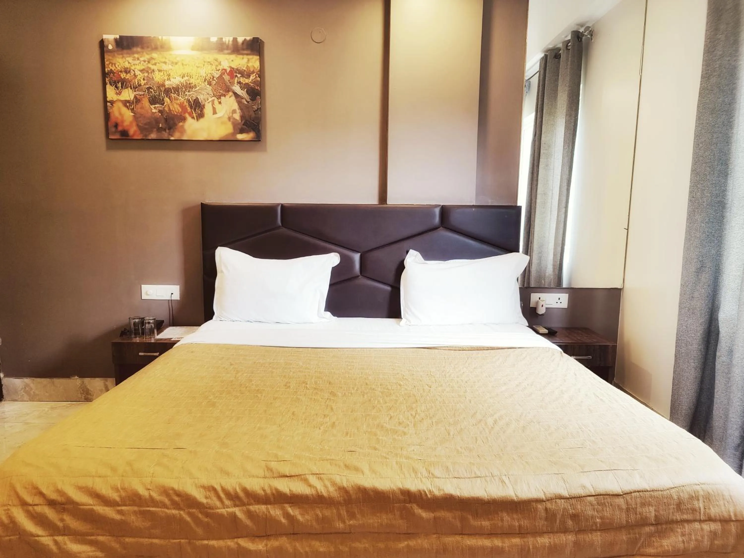View (from property/room), Bed in Hotel Aerocity Purple Orchid