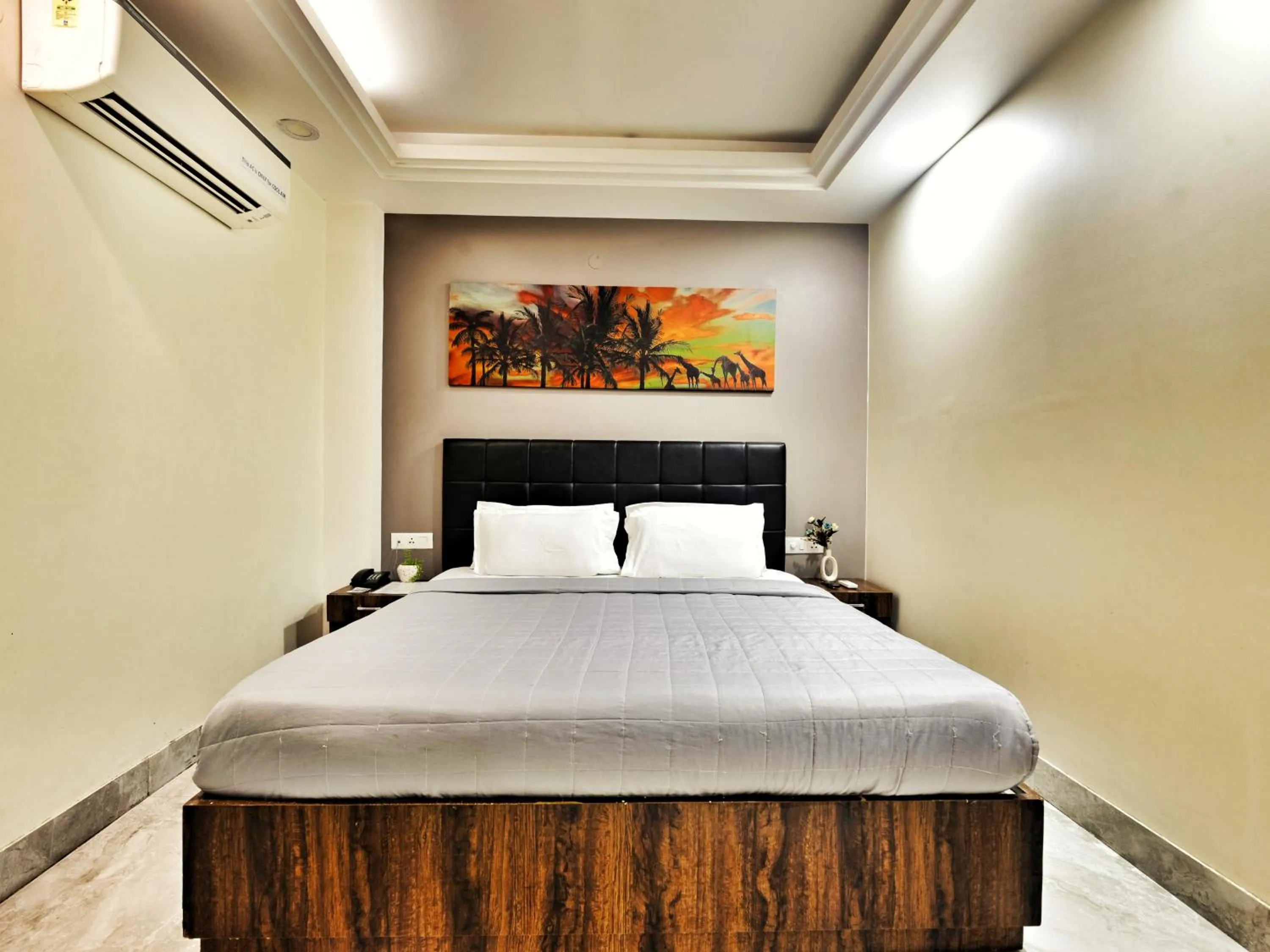 Bed in Hotel Aerocity Purple Orchid
