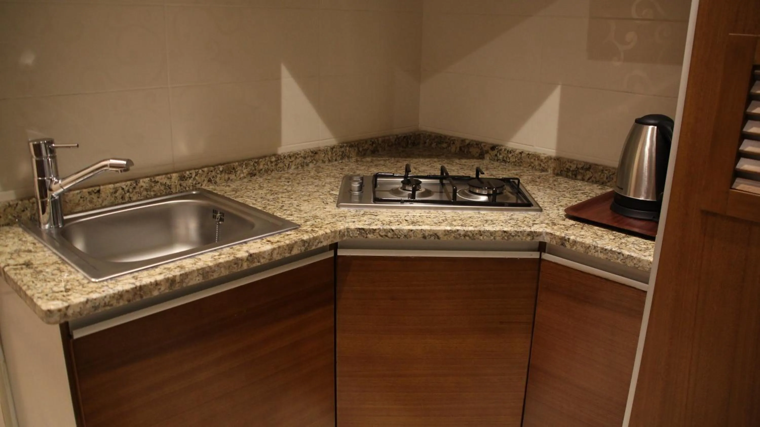Kitchen or kitchenette in Big Ben Hotel Suites