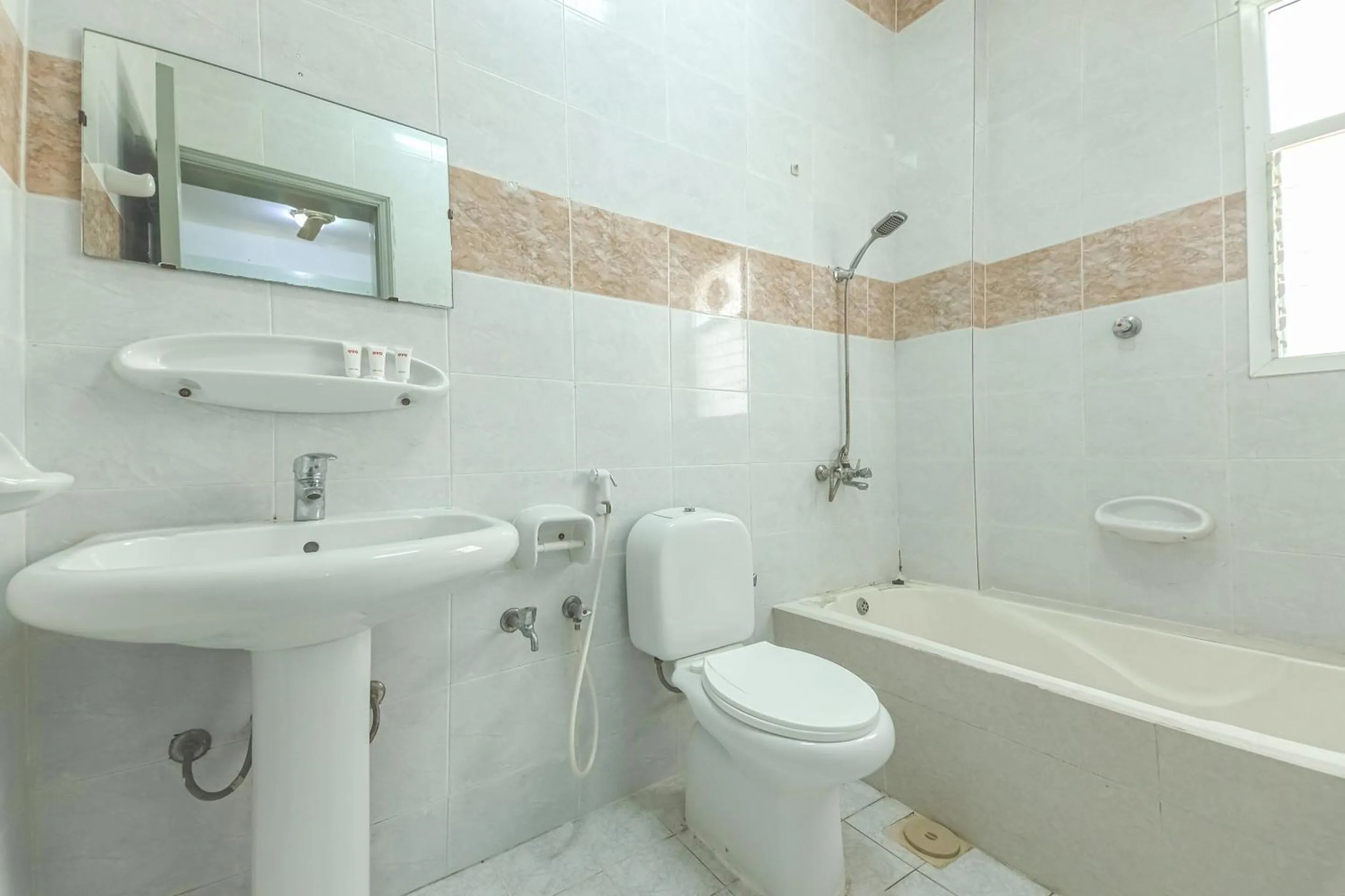 Bathroom in Super OYO 108 Marsa Al Masafar Hotel Apartment