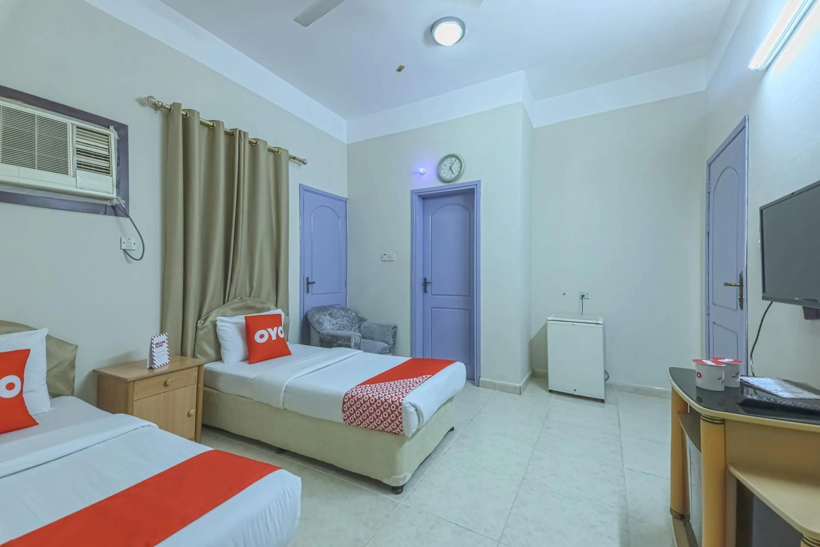 Bedroom in Super OYO 108 Marsa Al Masafar Hotel Apartment