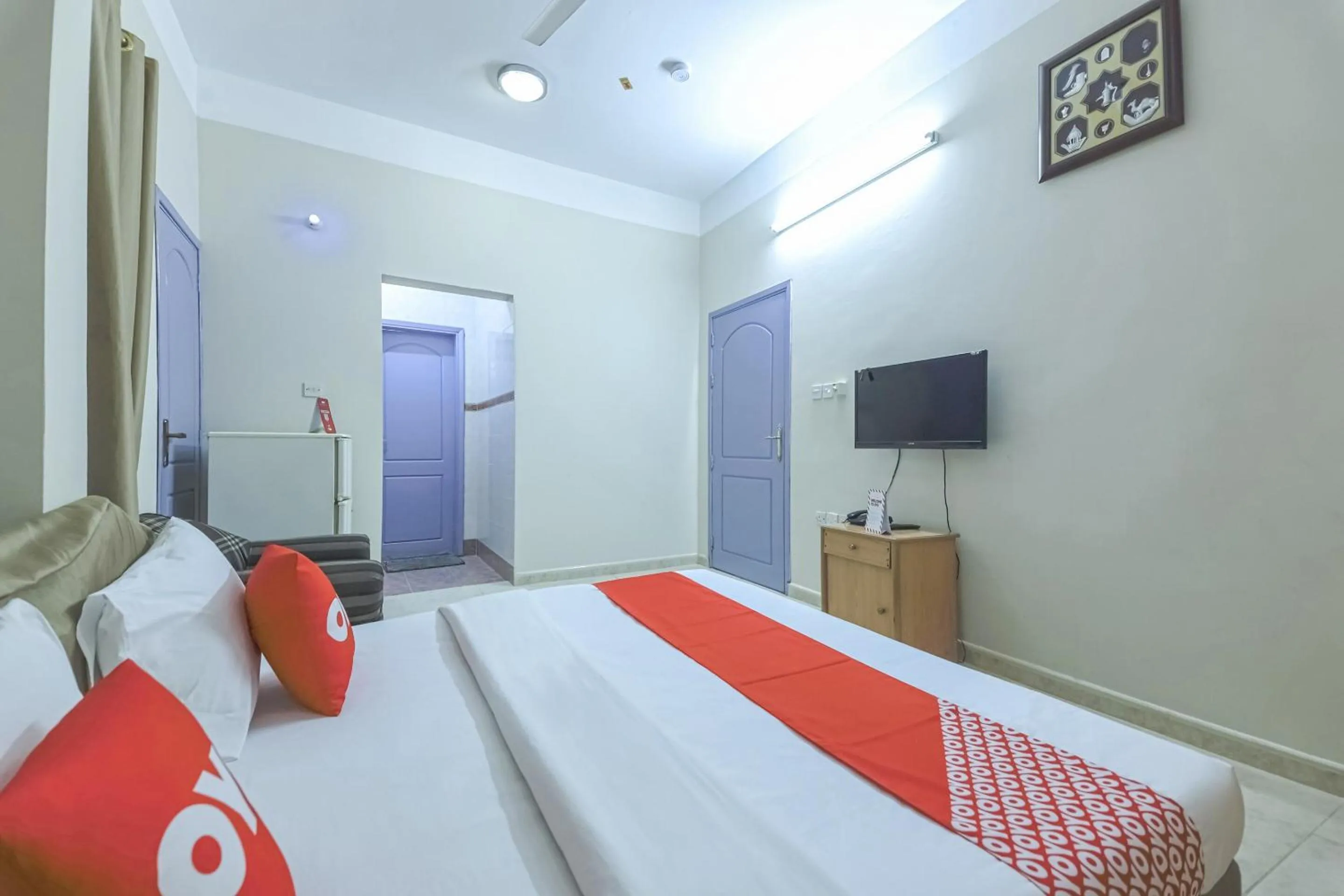 Bedroom in Super OYO 108 Marsa Al Masafar Hotel Apartment