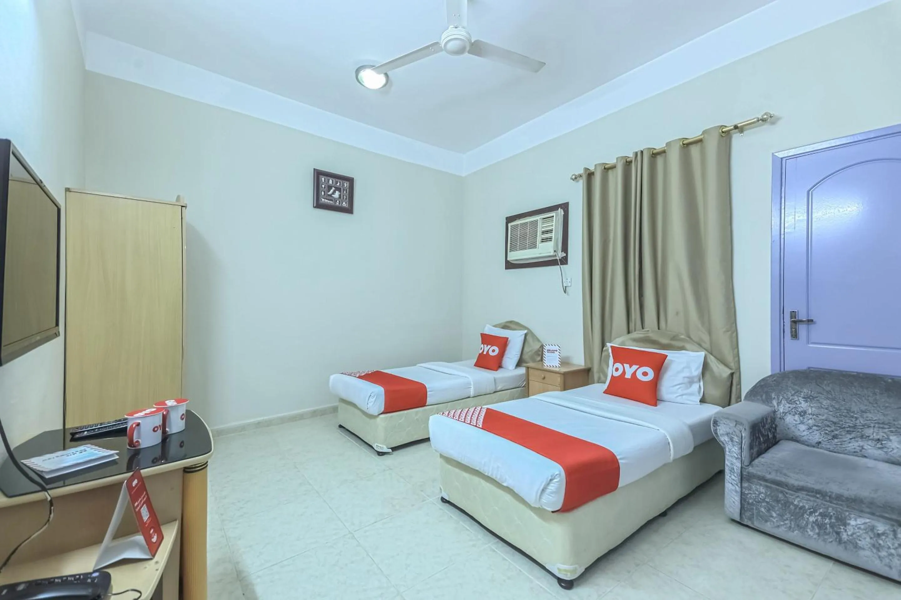 Bedroom in Super OYO 108 Marsa Al Masafar Hotel Apartment