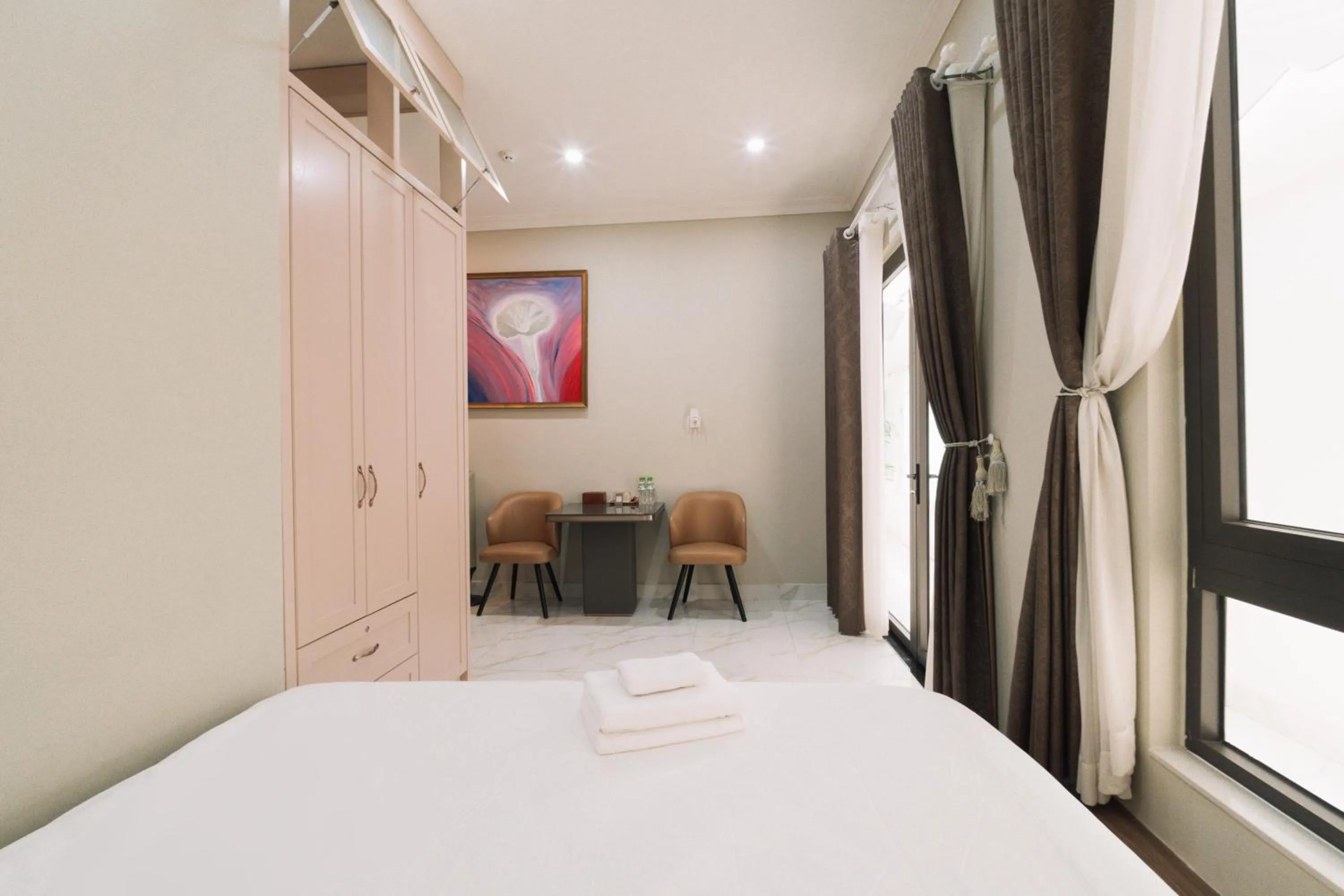 Bed in N Queen Apartment Hotel