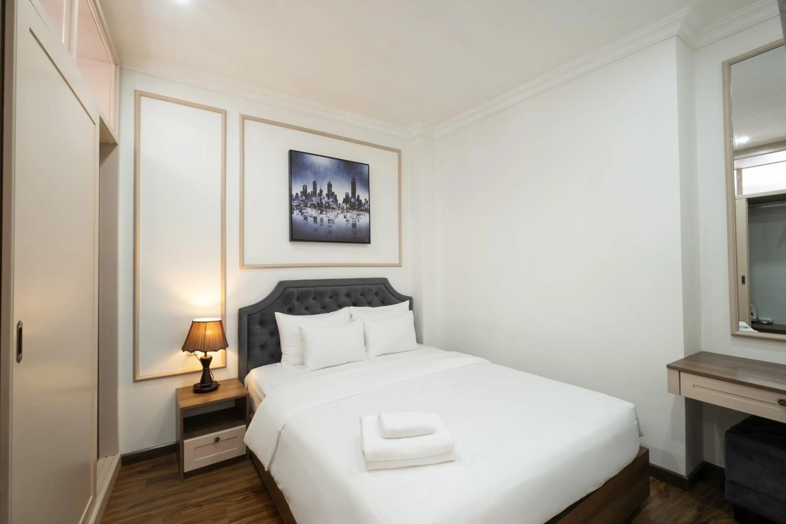 Bed in N Queen Apartment Hotel