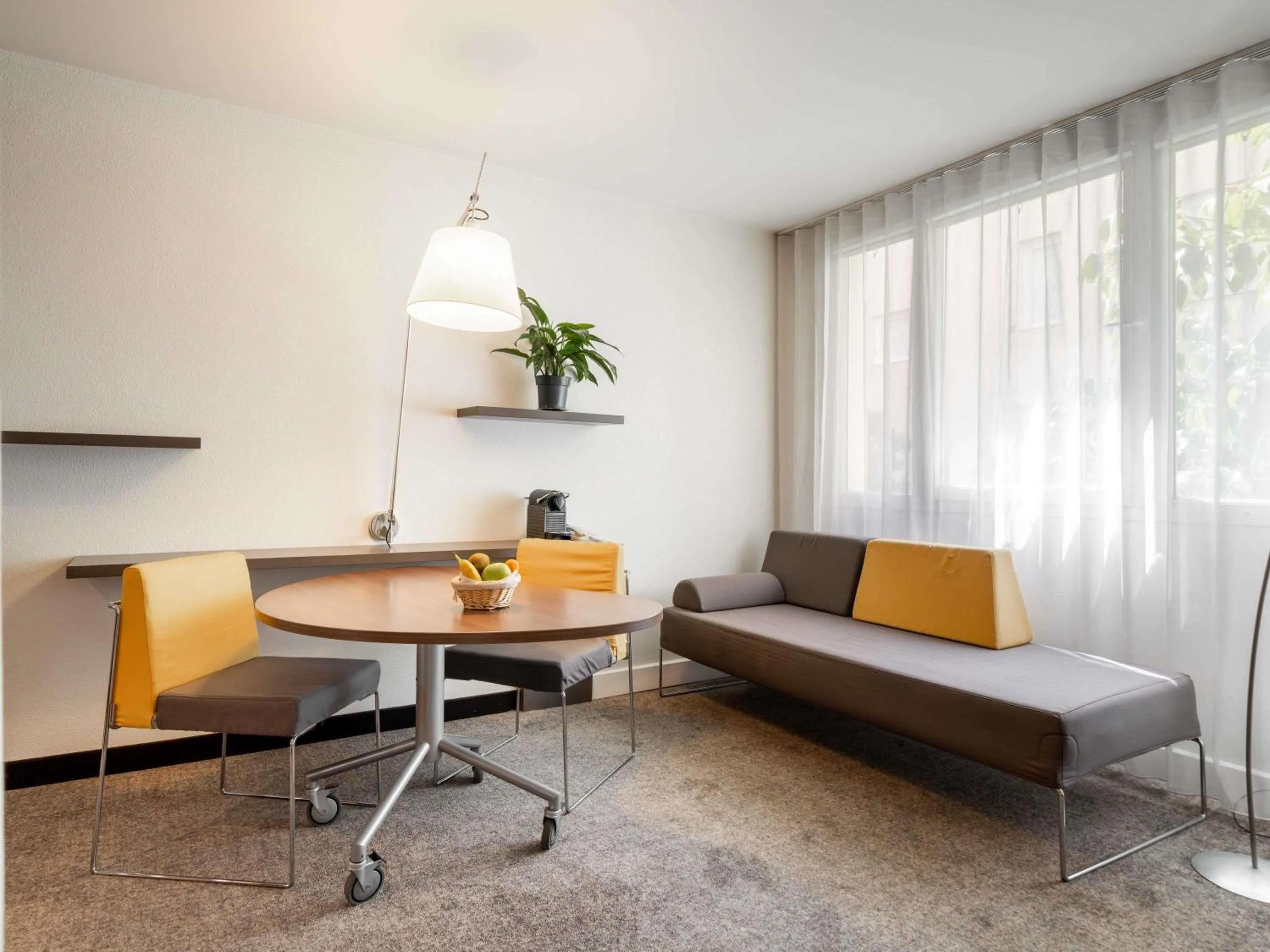 Bedroom in Novotel Suites Cannes Centre