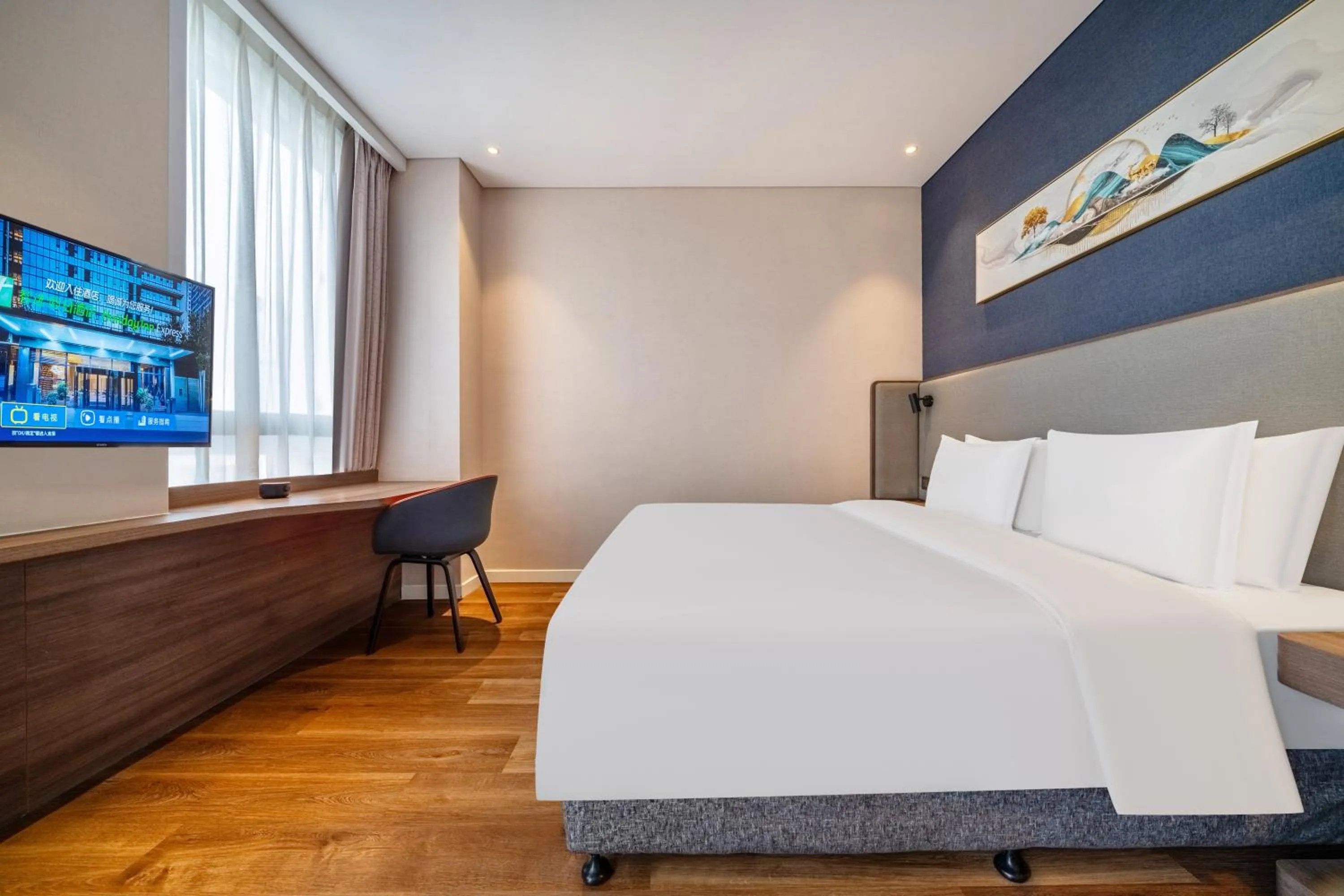 Bed in Holiday Inn Express Hangzhou Binjiang Aoti by IHG