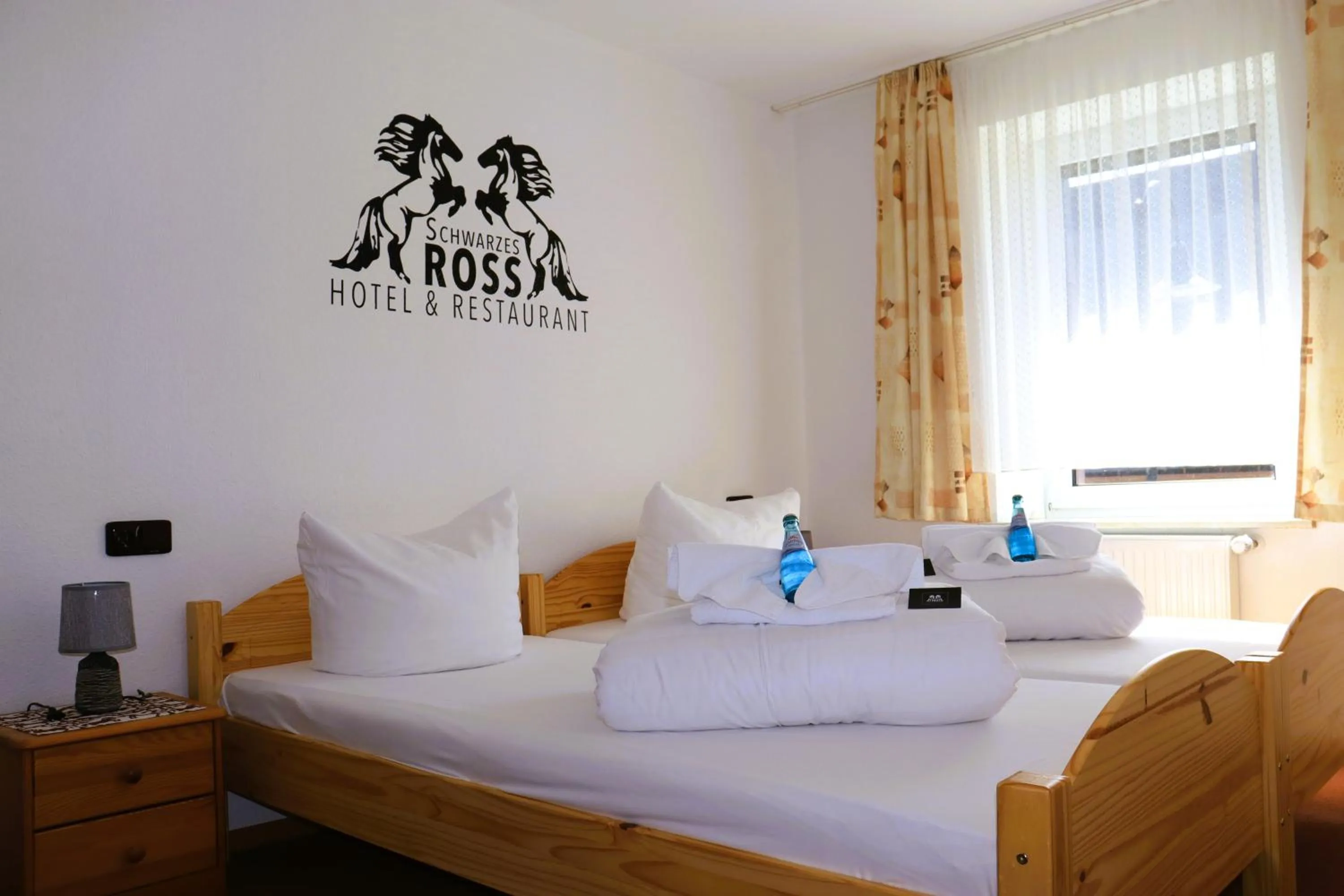 Photo of the whole room, Bed in Schwarzes Ross Hotel & Restaurant Oberwiesenthal