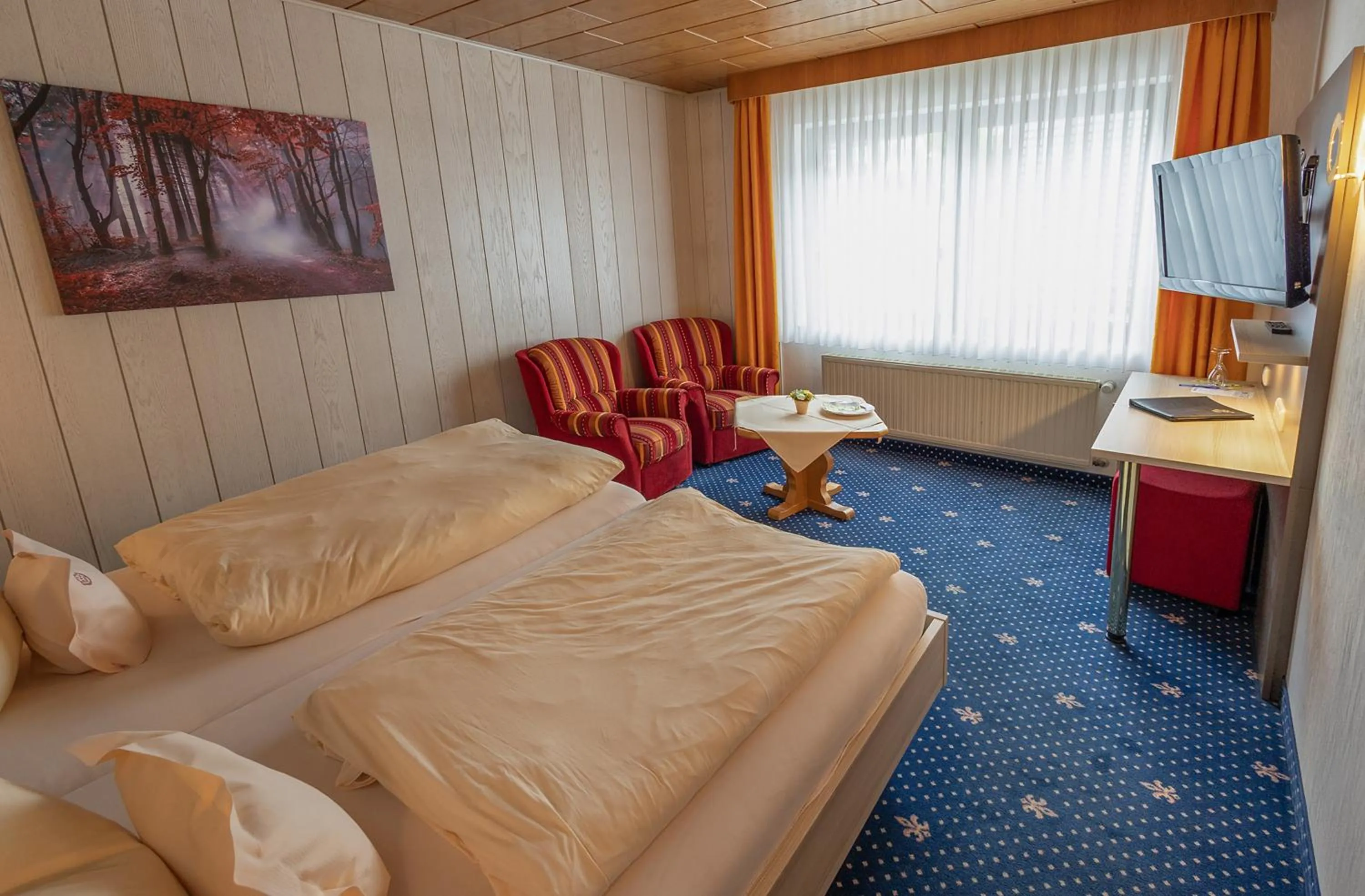 Bed in Sporthotel Göbel Garni
