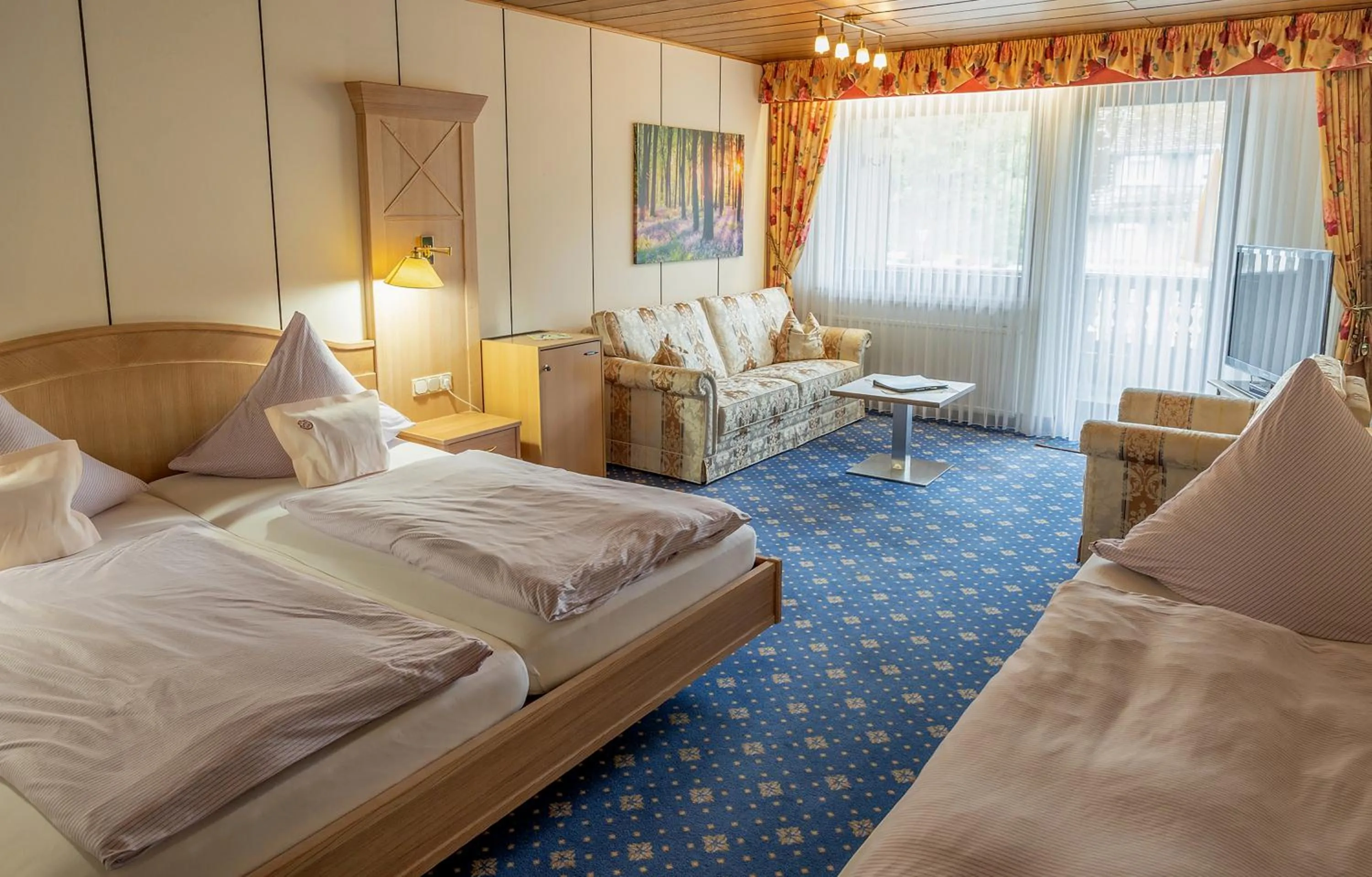 Bed in Sporthotel Göbel Garni