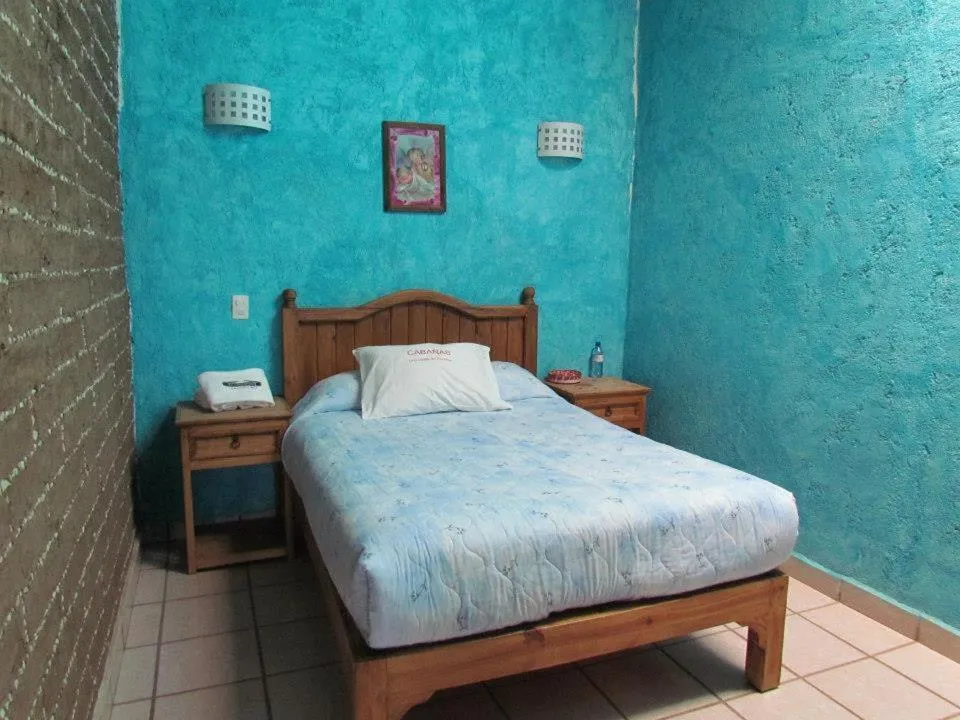 Bed in Hotel y Cabañas una Cosita de Zacatlán