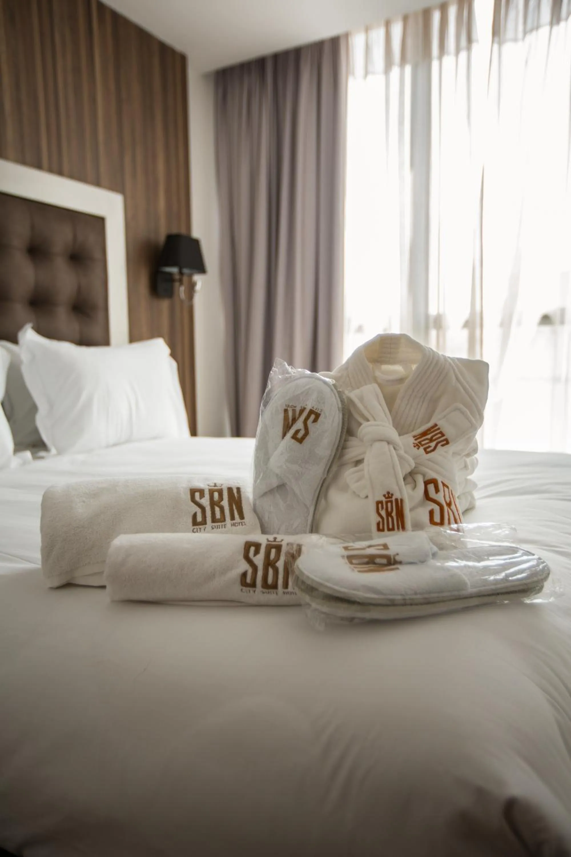 Bed in SBN Suite Hôtel