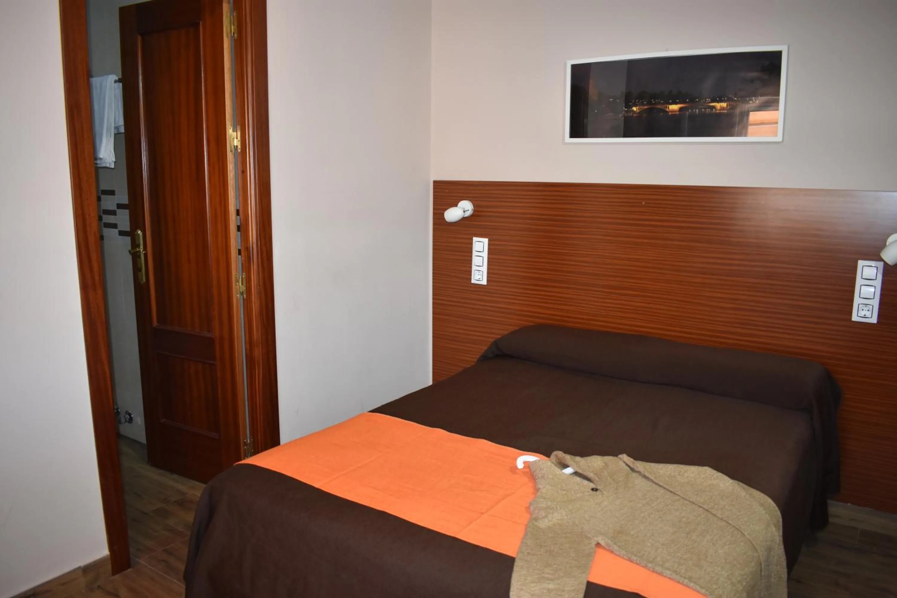 Bed in Hostal Alamare