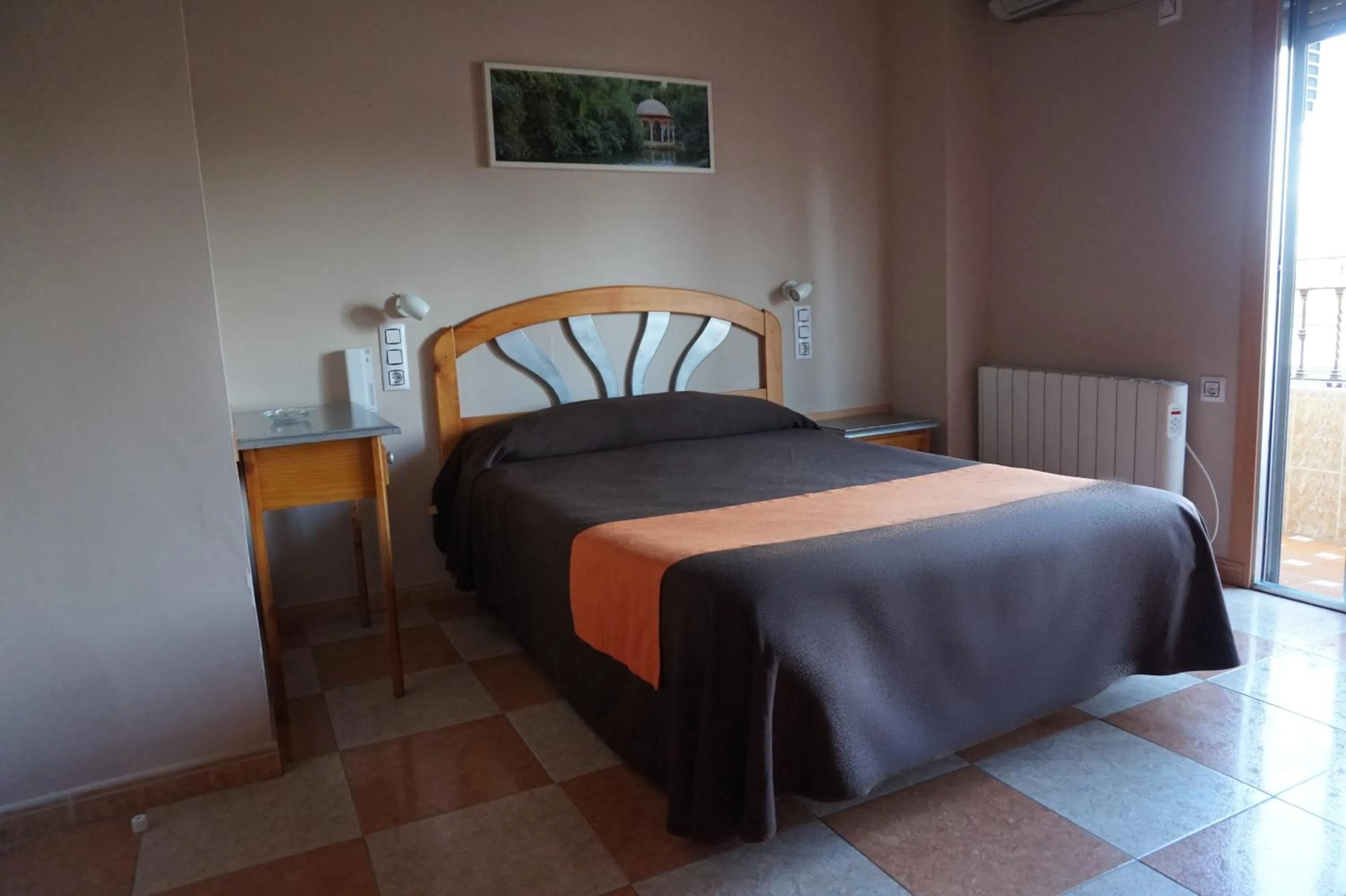 Bed in Hostal Alamare