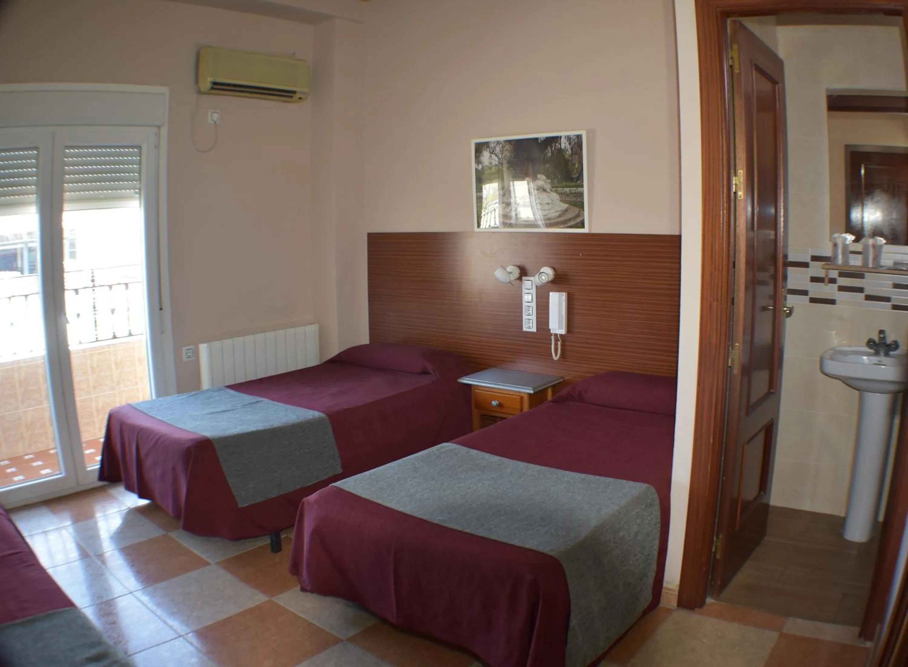 Photo of the whole room, Bed in Hostal Alamare
