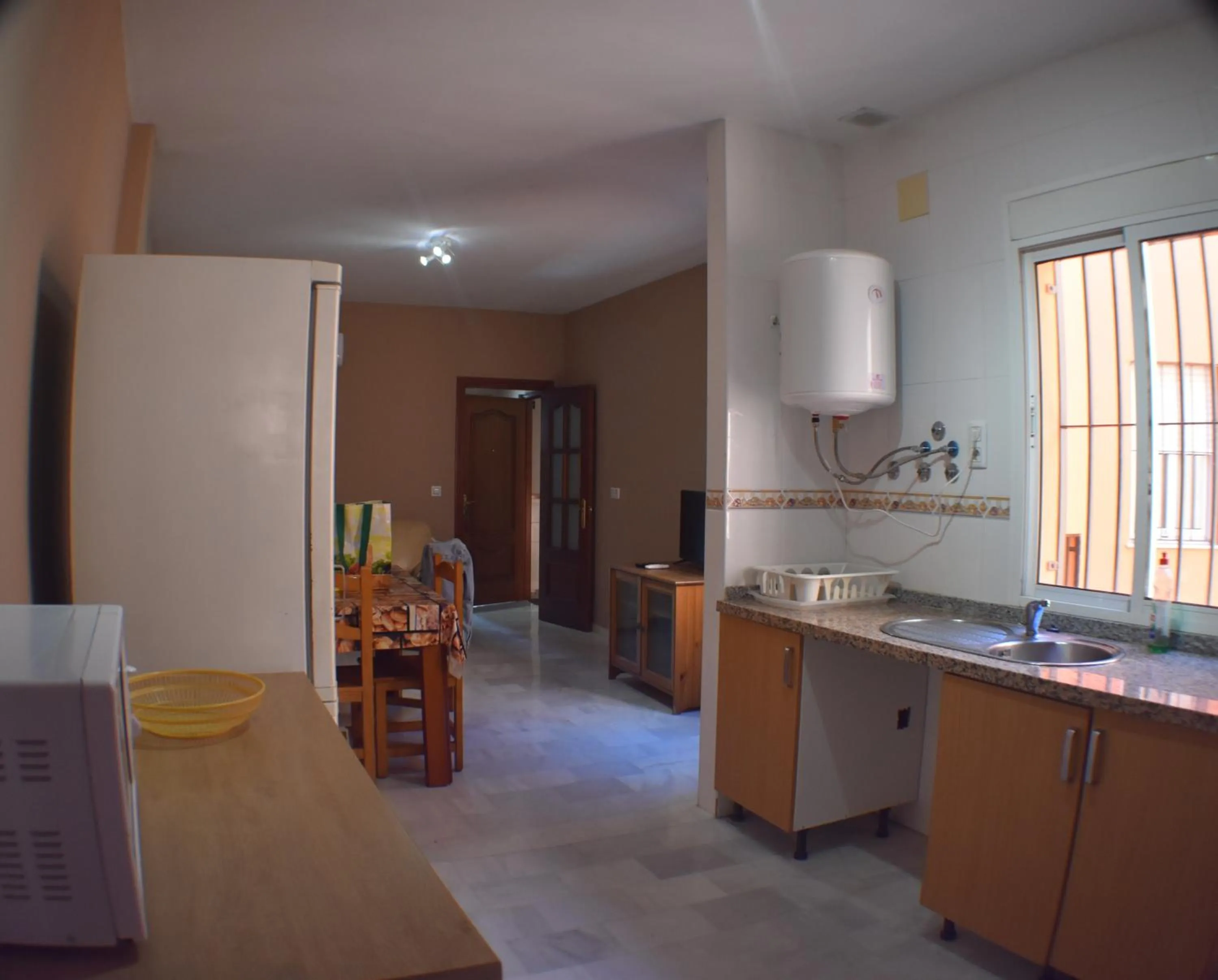 Kitchen or kitchenette in Hostal Alamare