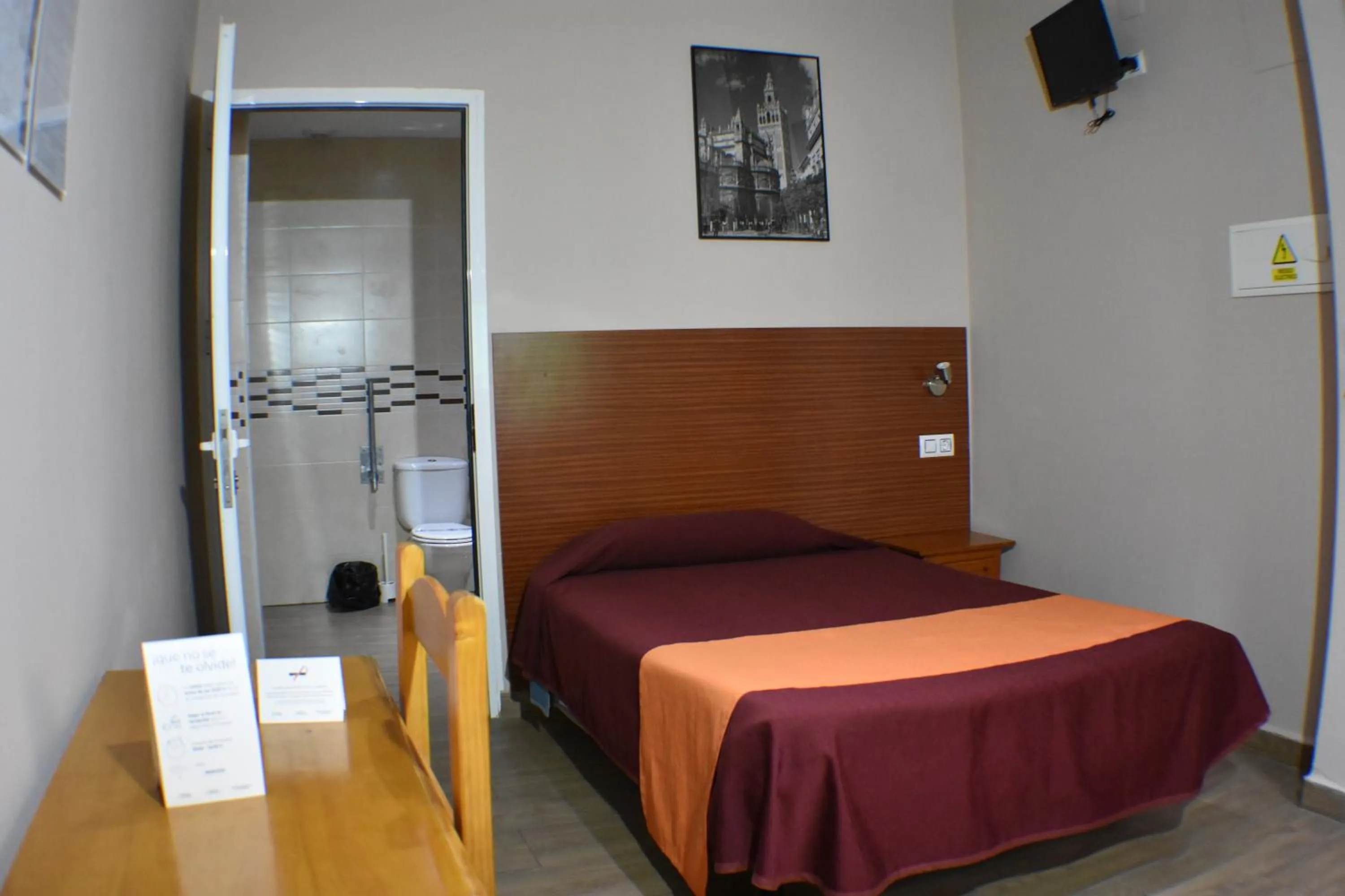 Bed in Hostal Alamare