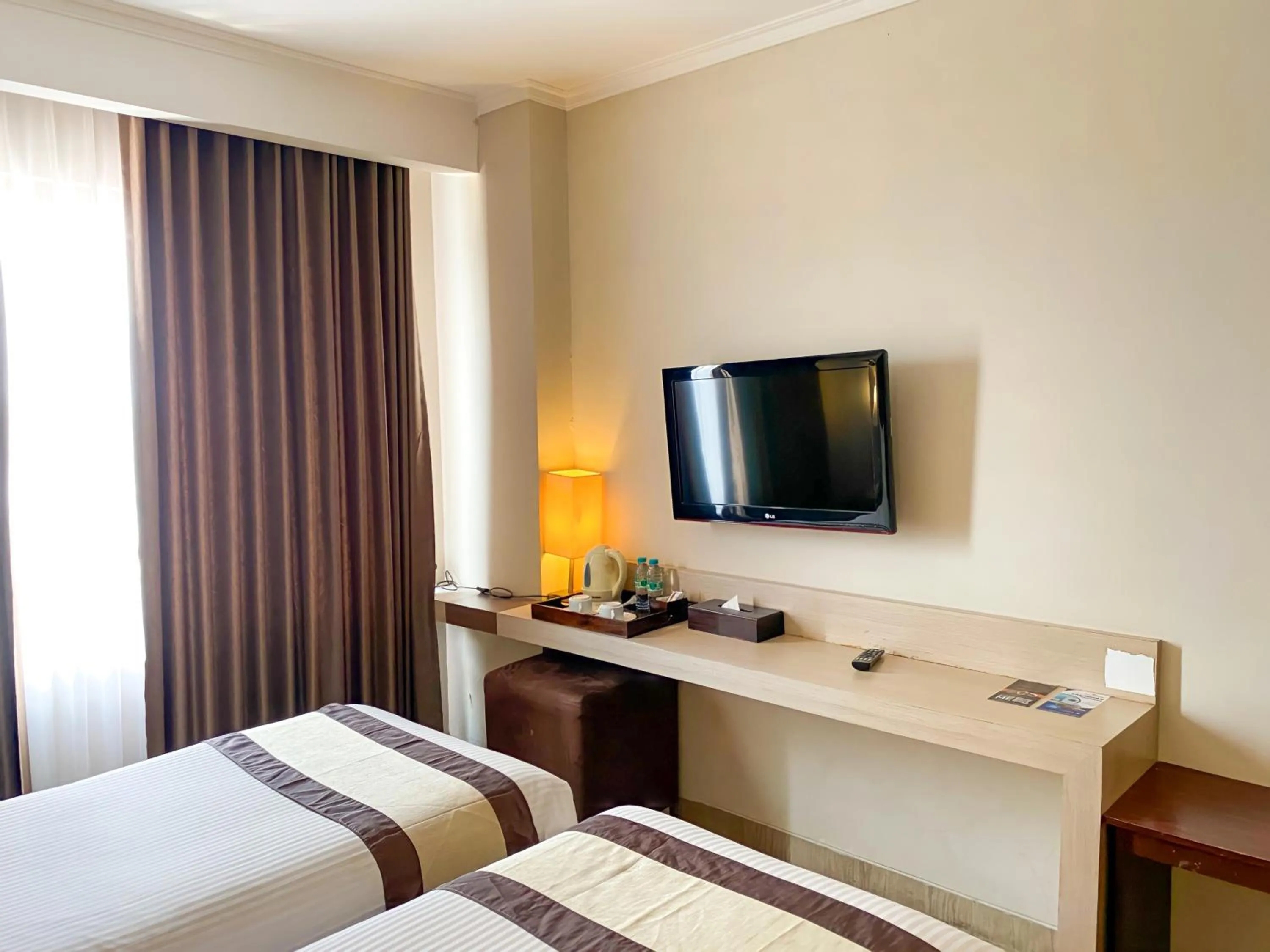 TV and multimedia, Bed in Bueno Colombo Hotel Yogyakarta