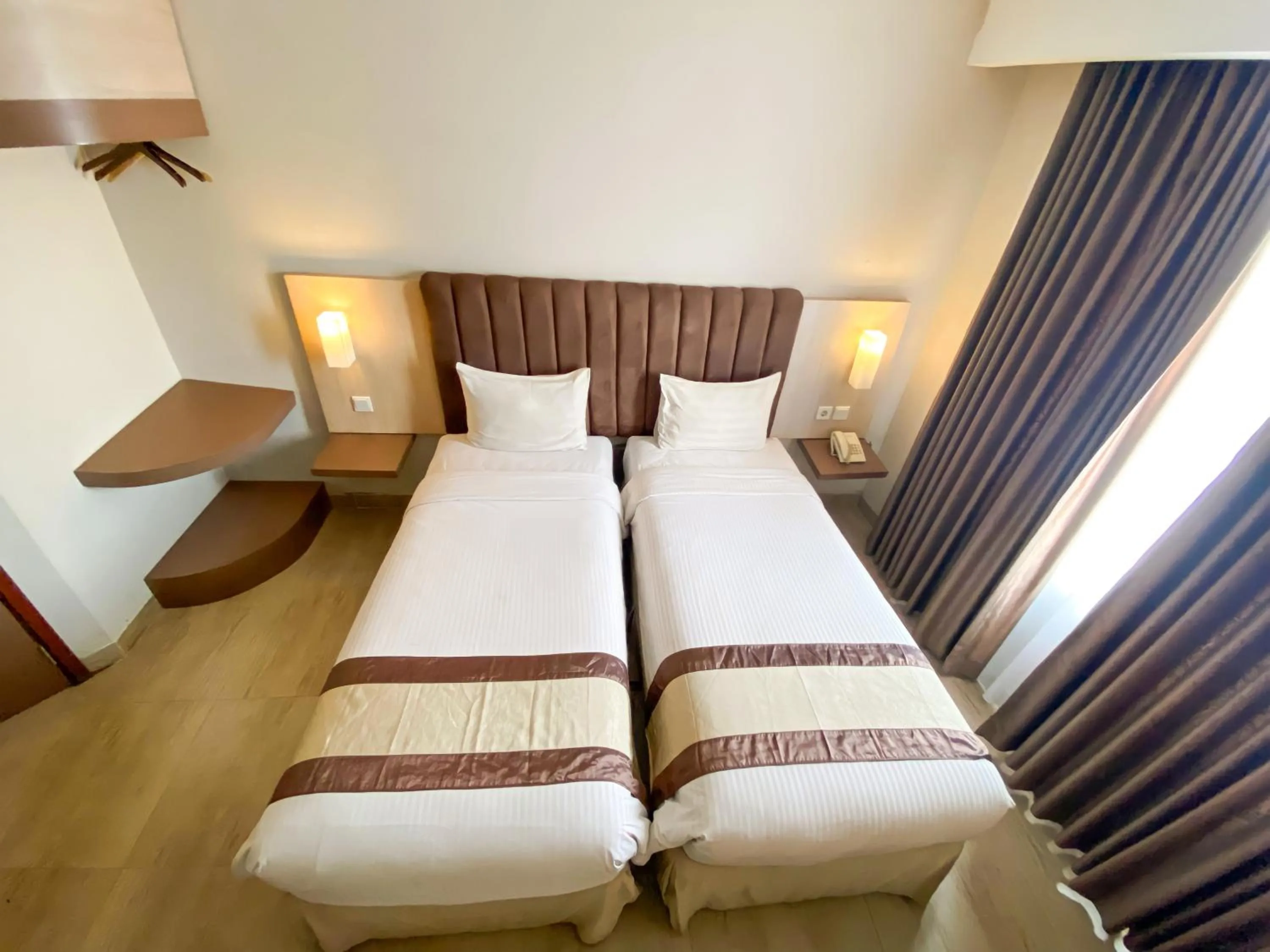 Bedroom, Bed in Bueno Colombo Hotel Yogyakarta