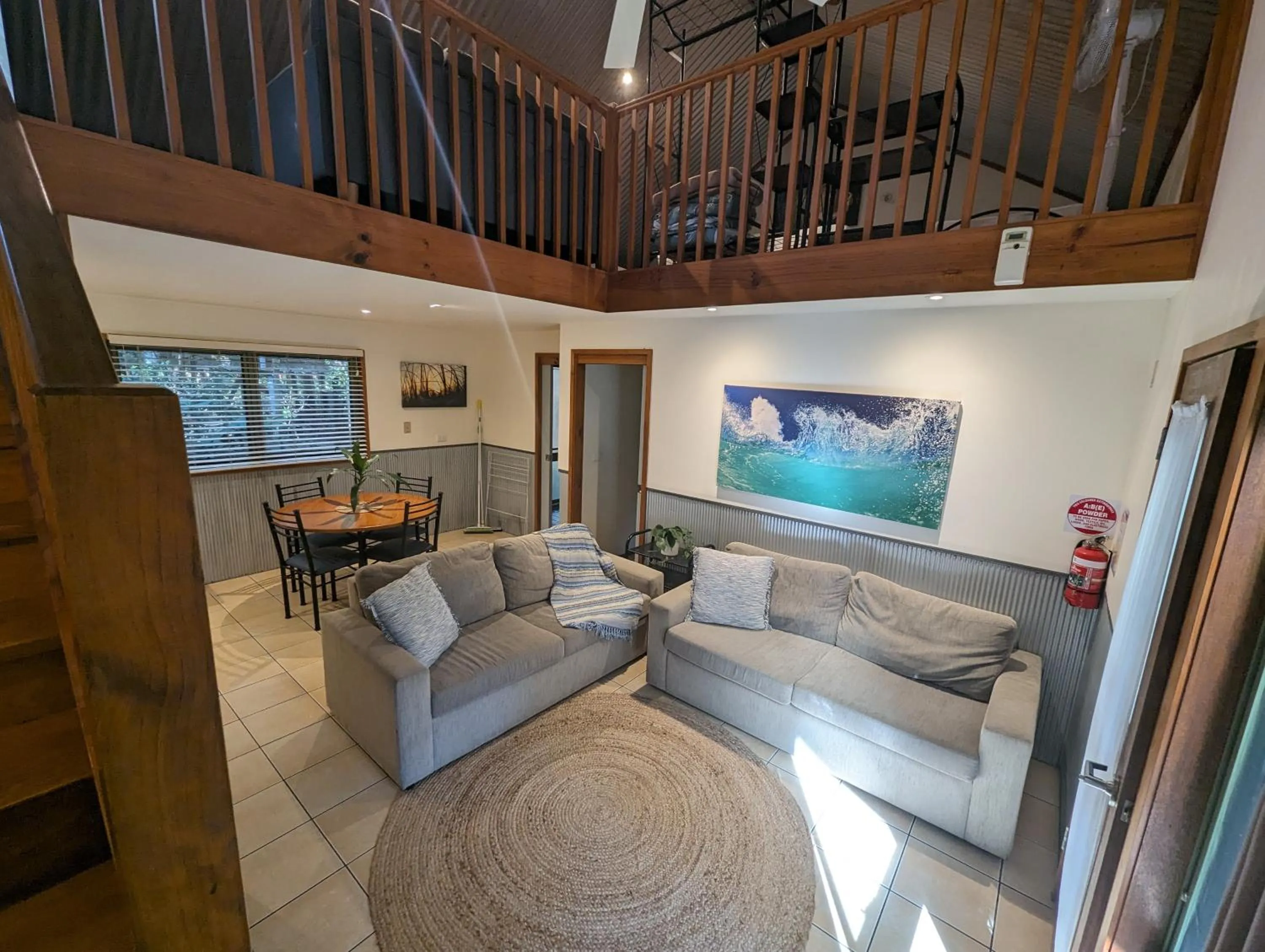 Living room in The Oasis at One Mile Beach