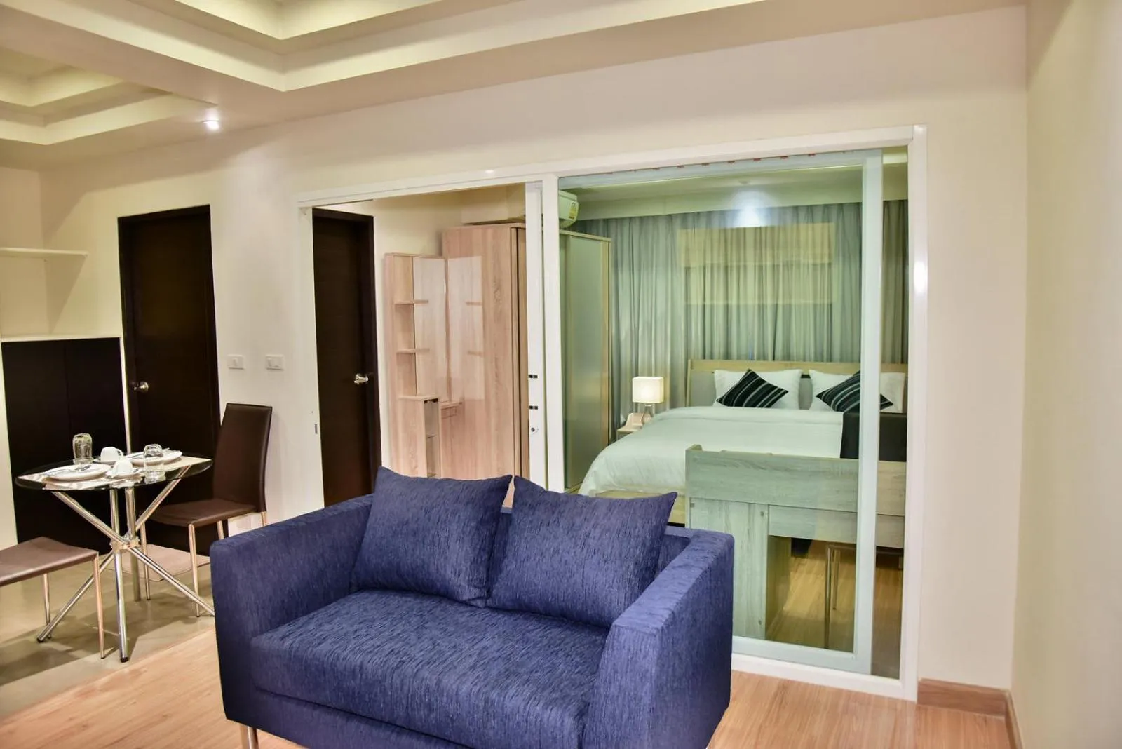 Living room, Bed in The Kaze 34 Hotel and Serviced Residence