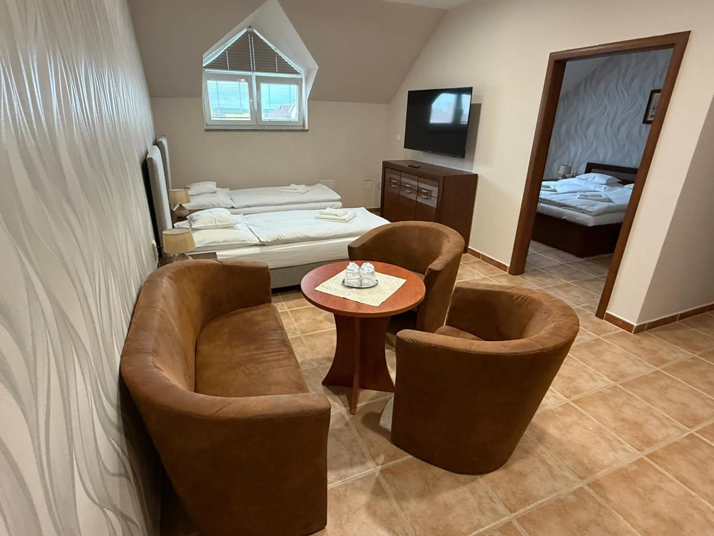 Two-Bedroom Loft Apartment in Hotel Orchidea Spa & Wellness Two-Bedroom Loft Apartment in Hotel Orchidea Spa & Wellness