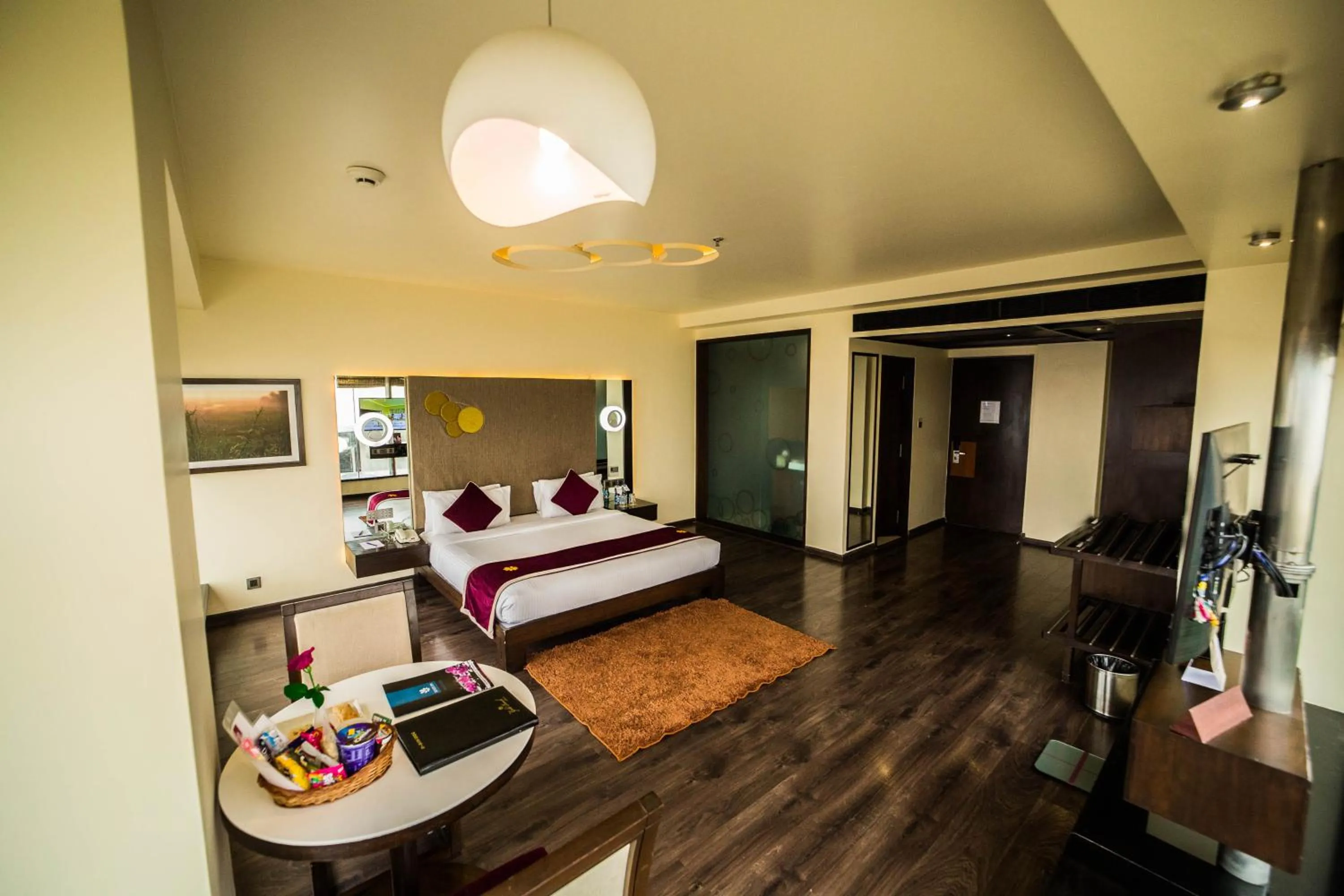 Living room, Bed in The Gold Beach Resort