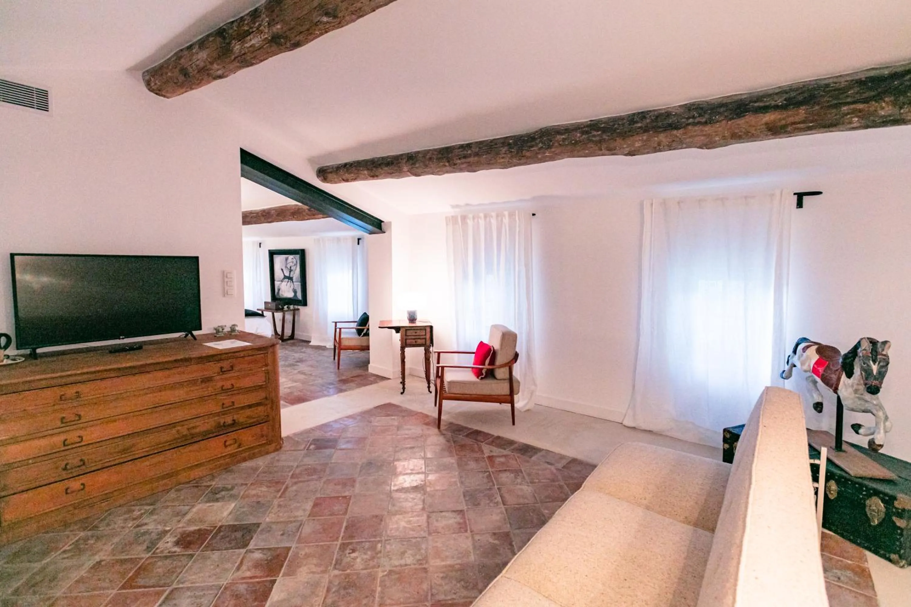 Seating area, TV/Entertainment Center in Gabrielle Jeanne