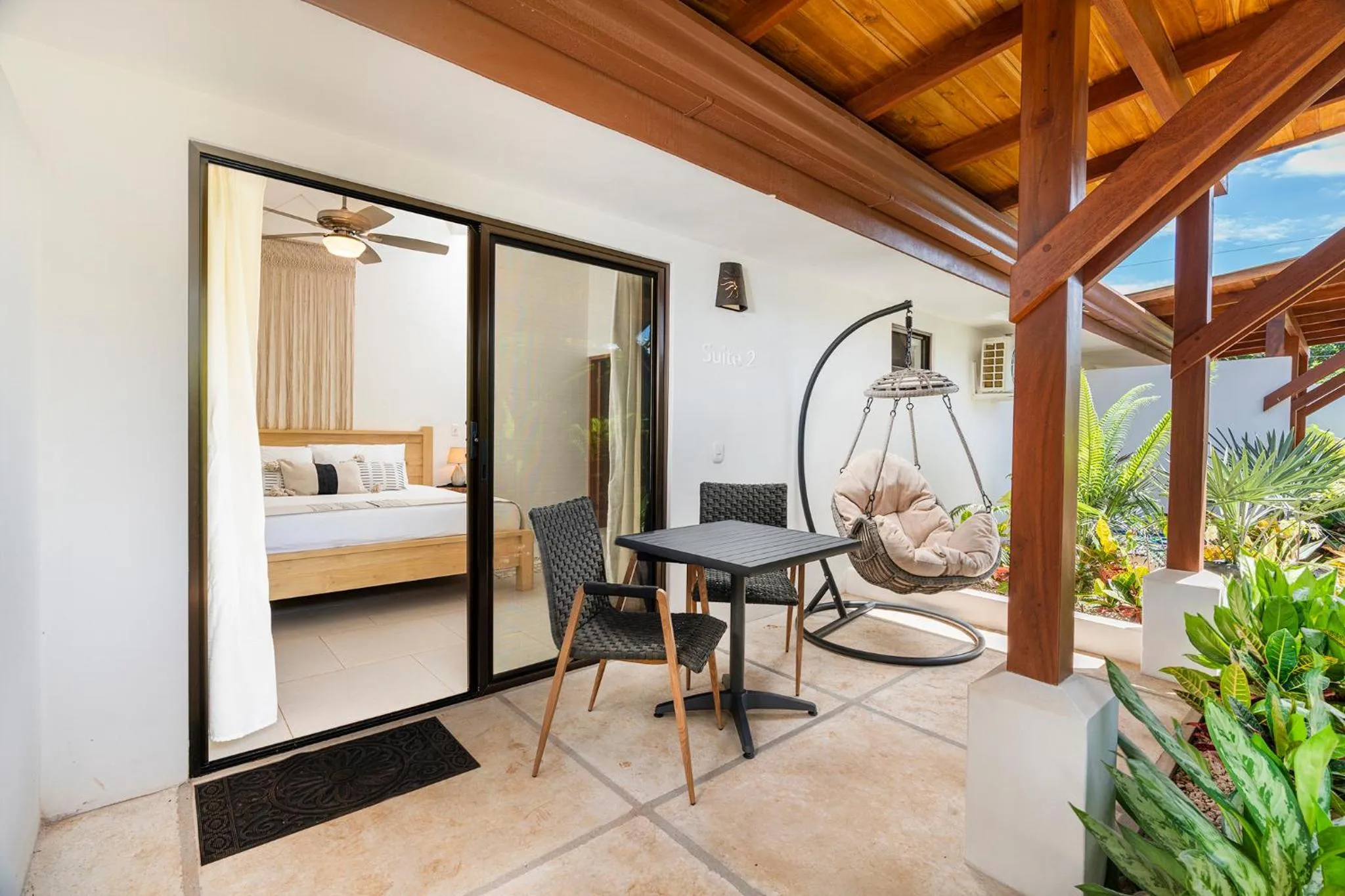 Patio, Bed in Cafe Playa Negra Hotel