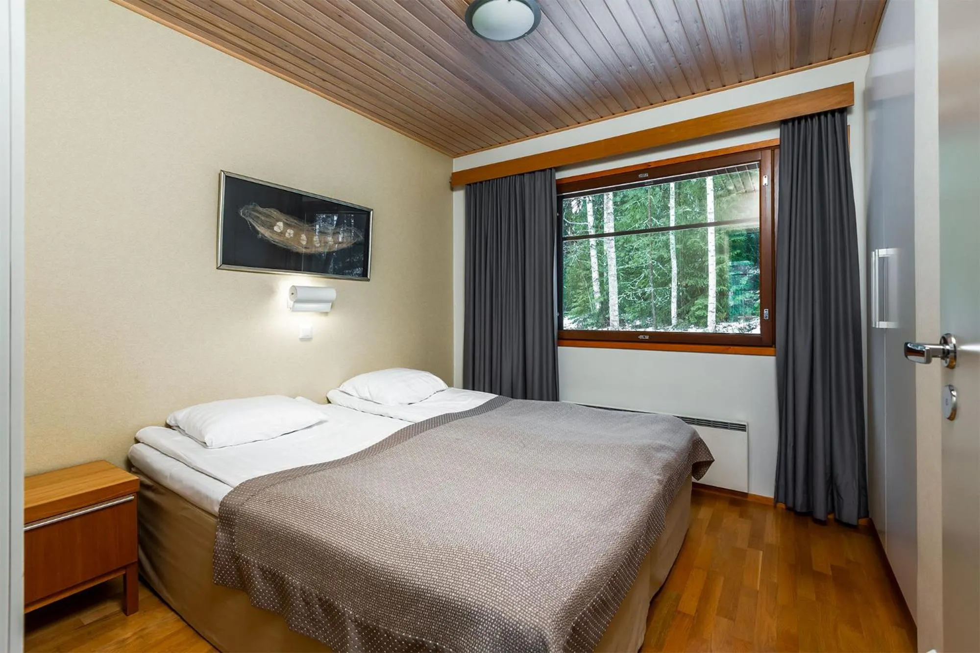 Bedroom, Bed in Imatran Kylpylä Spa Apartments