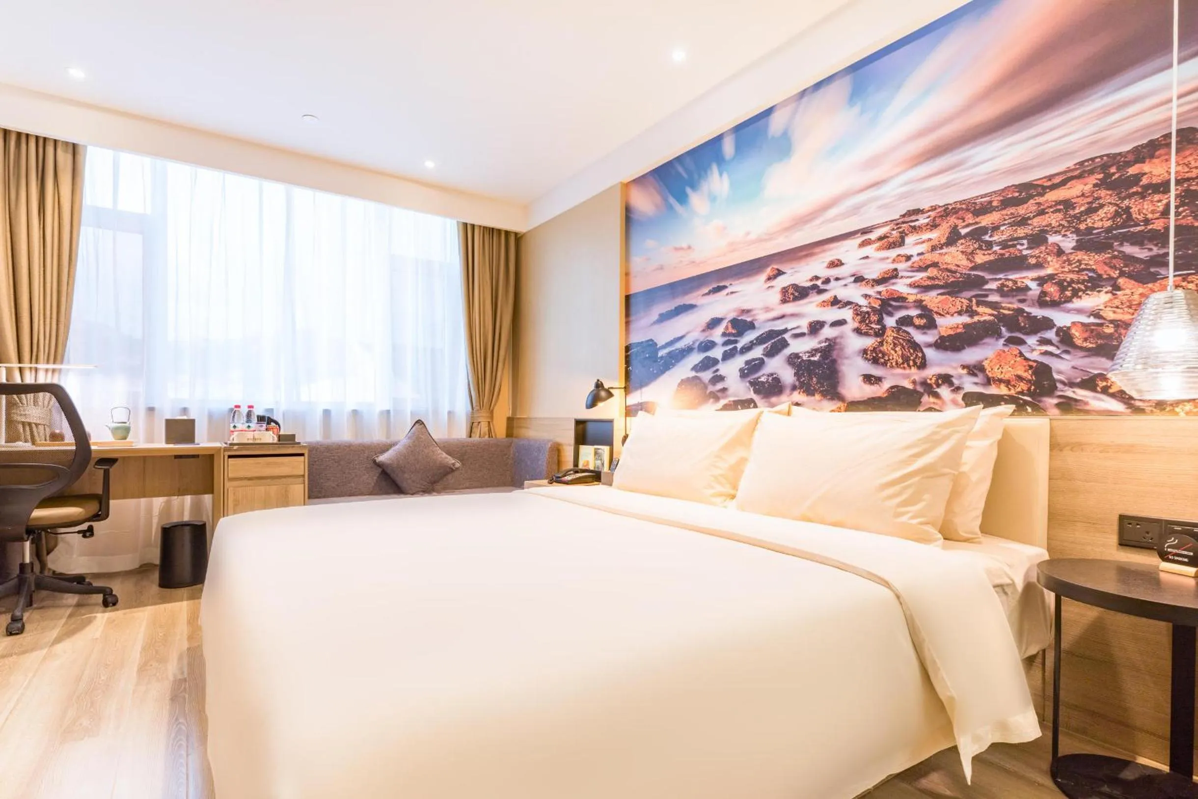 Bed in Atour Hotel Weihai City Center