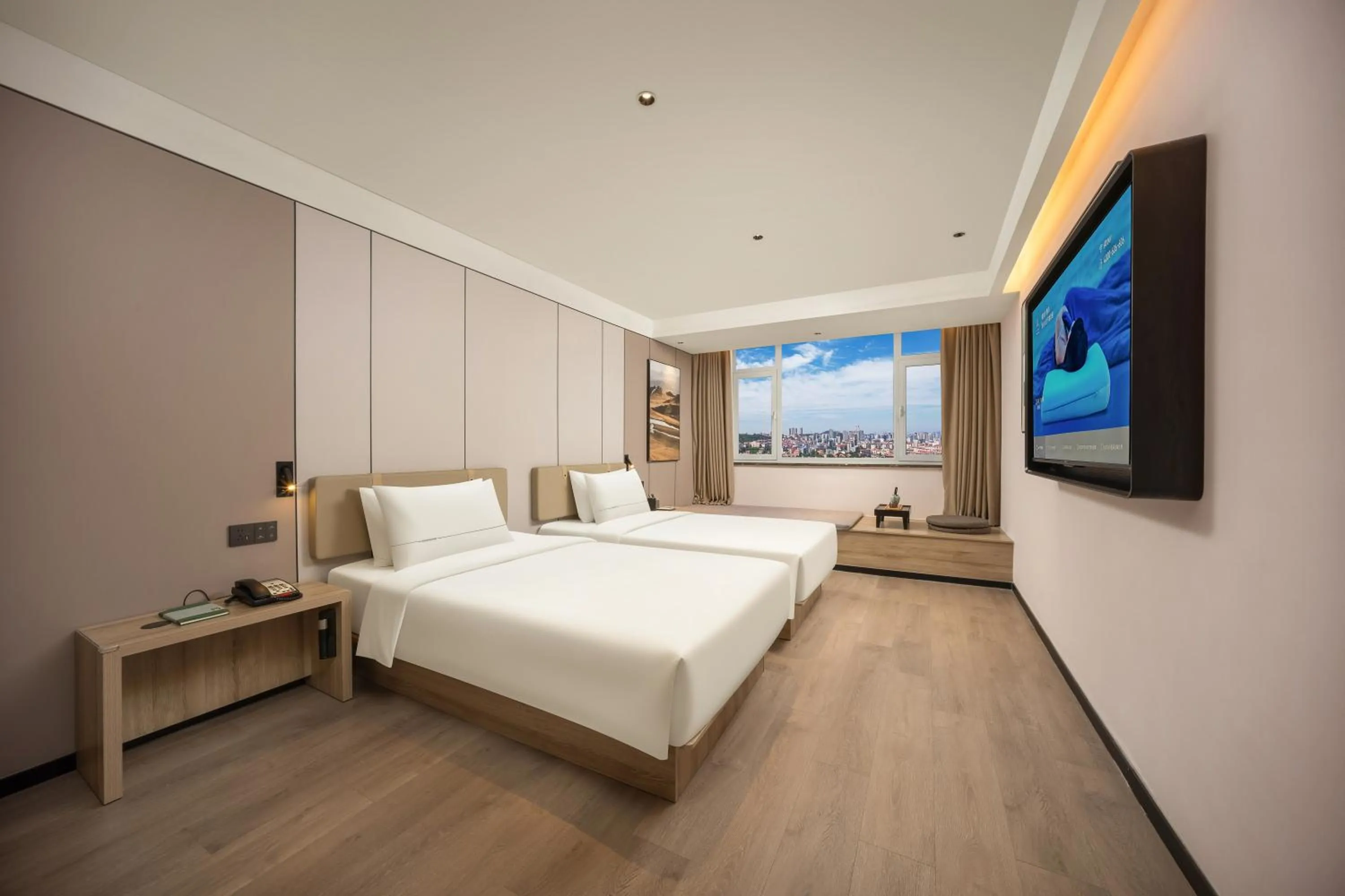 Bed in Atour Hotel Weihai City Center