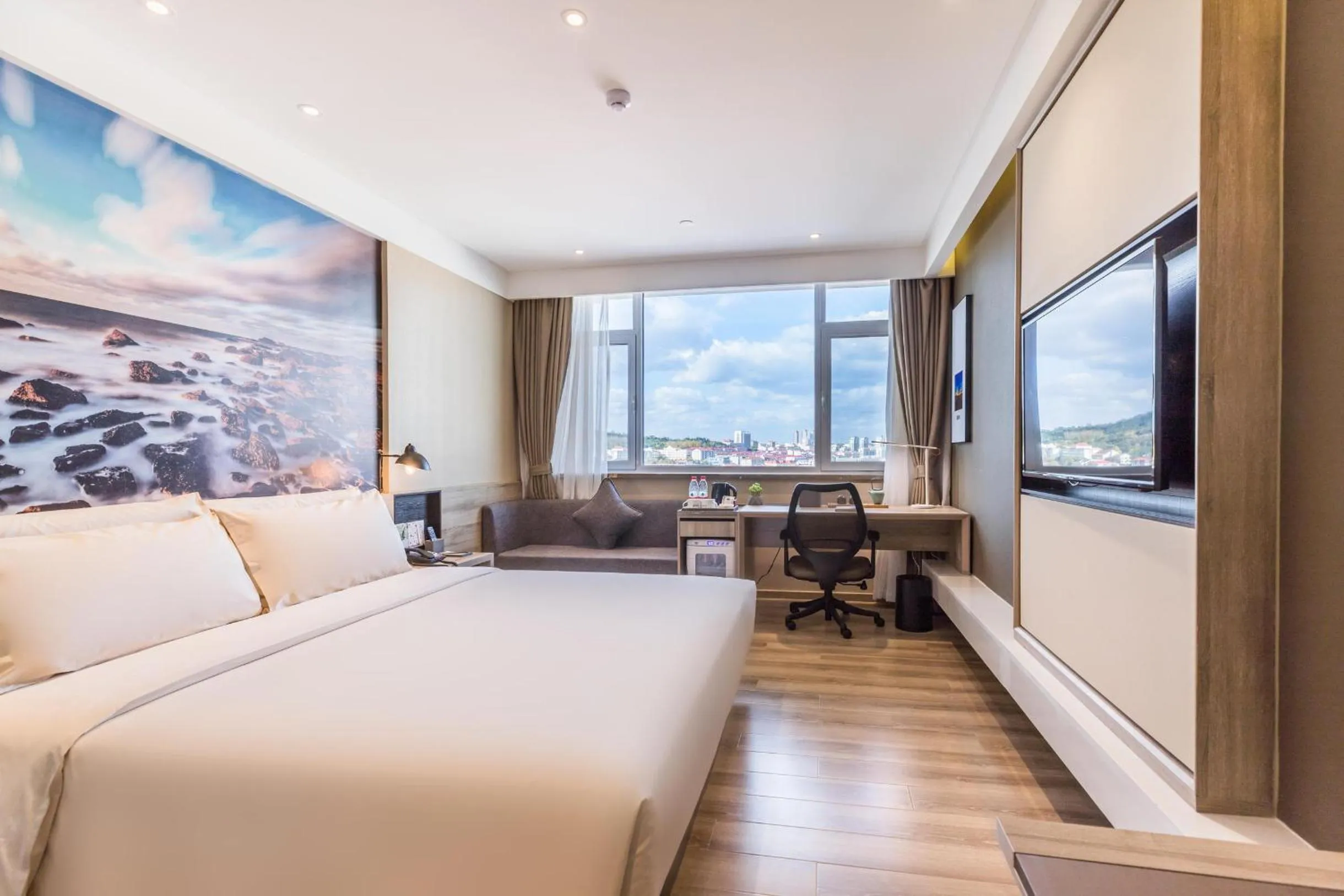 Bed in Atour Hotel Weihai City Center